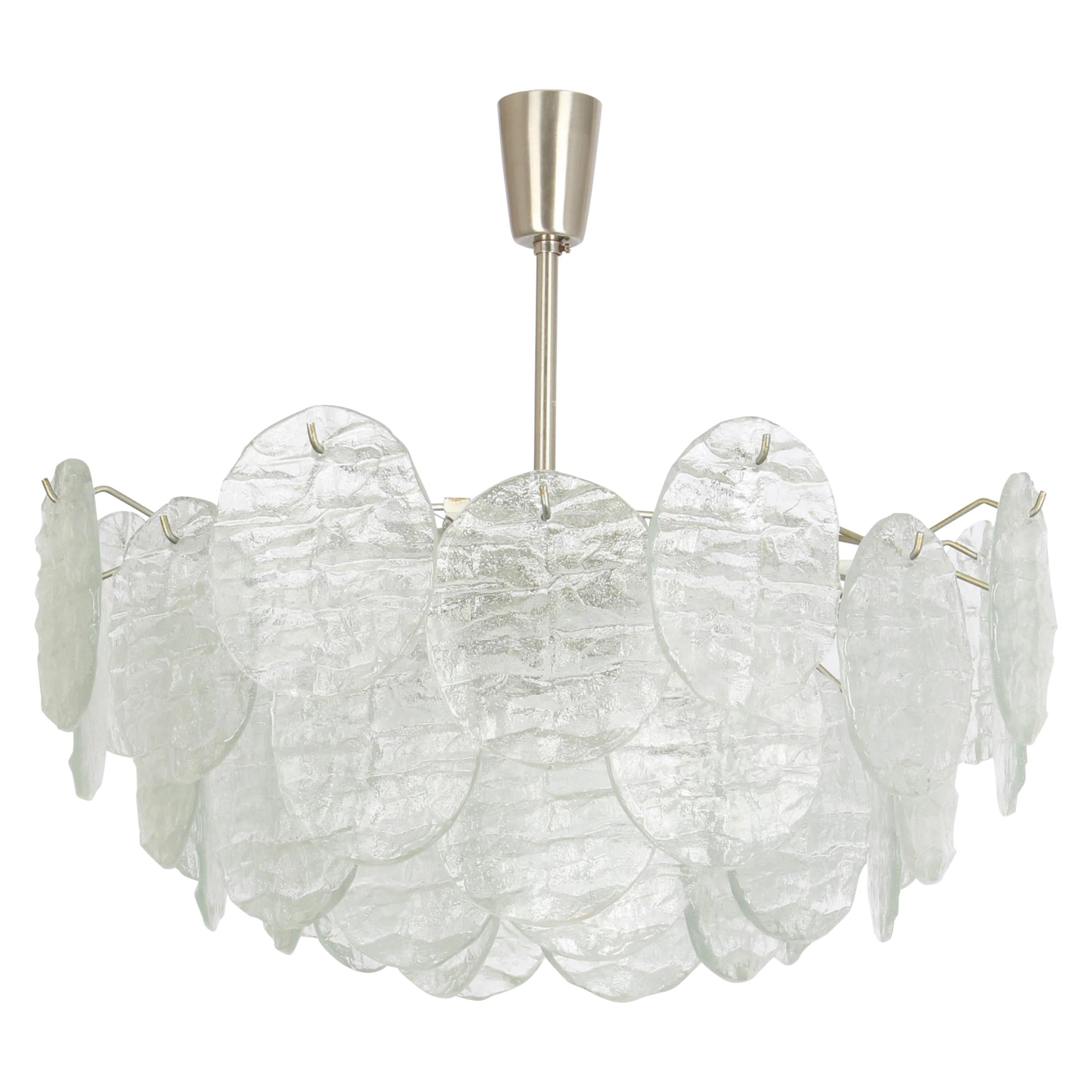 Stunning Murano glass chandelier by Kalmar, 1960s
Five tiers structure gathering 44 disc-shaped glasses in the form of leaves hang on a nickel-plated wireframe, beautifully refracting the light.

High quality and in very good condition with minor
