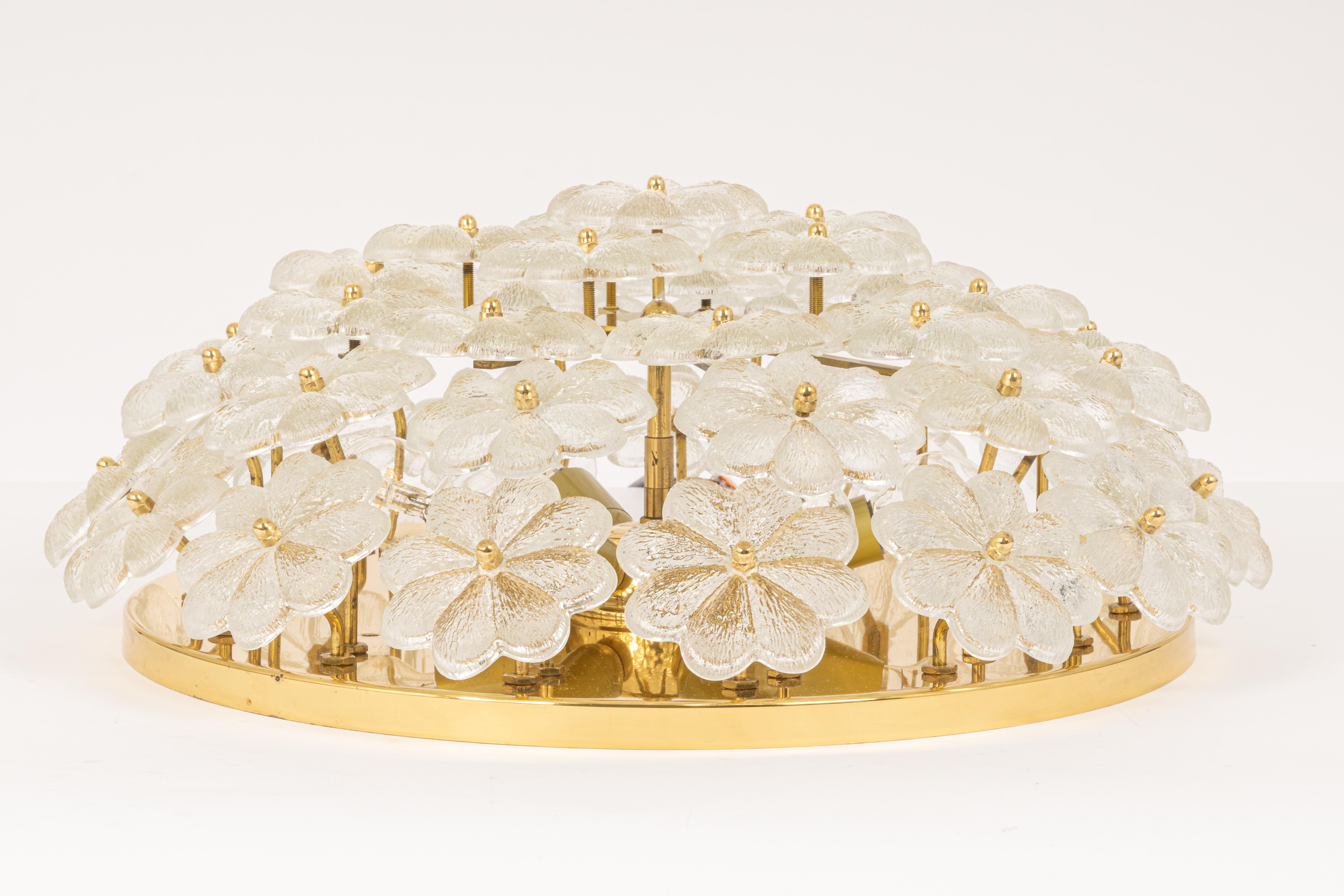 Midcentury flush mount light or sconce with 42 Murano glass flowers over a polished brass base, made by Ernst Palme in Germany in, 1970s.

High quality and in very good condition. Cleaned, well-wired and ready to use. 

The fixture requires 6 x E14
