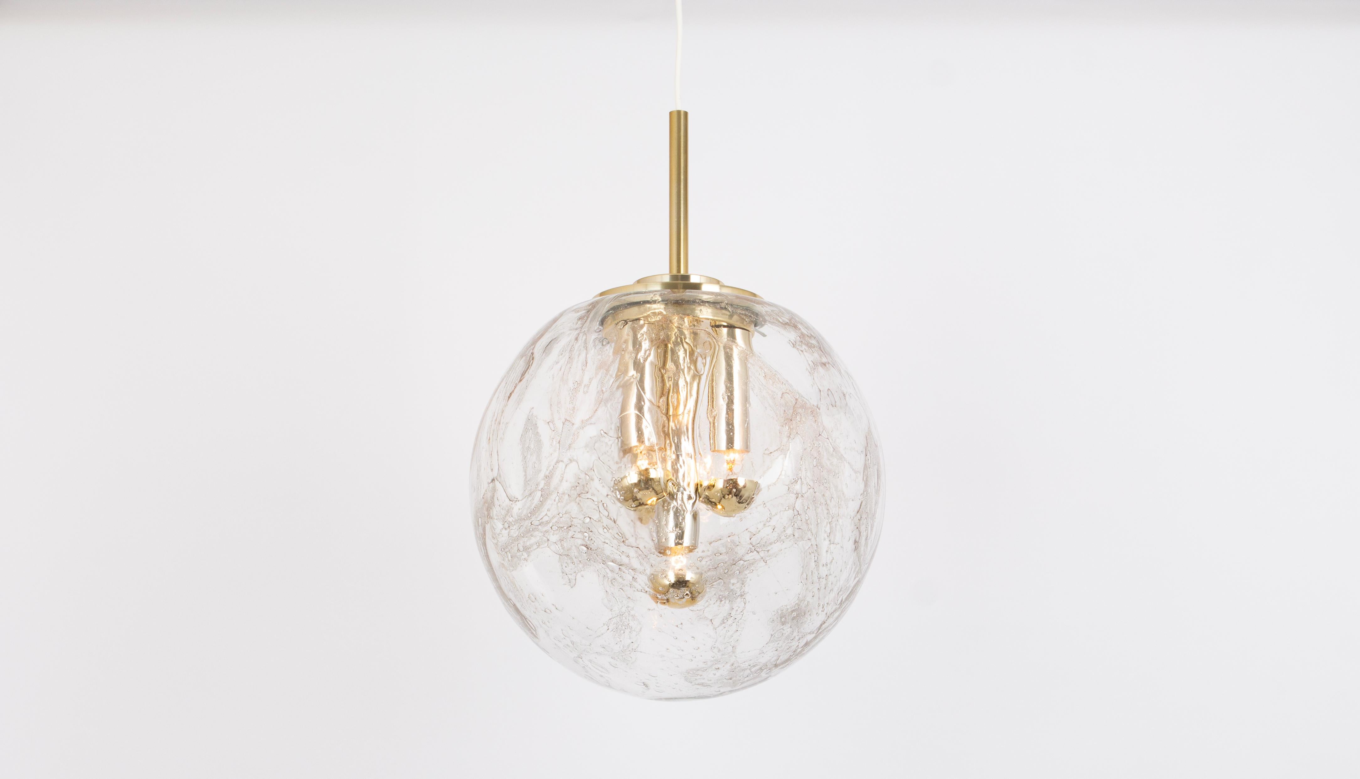 1 of 2 stunning Doria ceiling lights with large volcanic Murano crystal glass dome
The frame is made of brass and aluminum parts, in gold and chrome colors. 

High quality and in very good condition. Cleaned, well-wired and ready to use. 

The