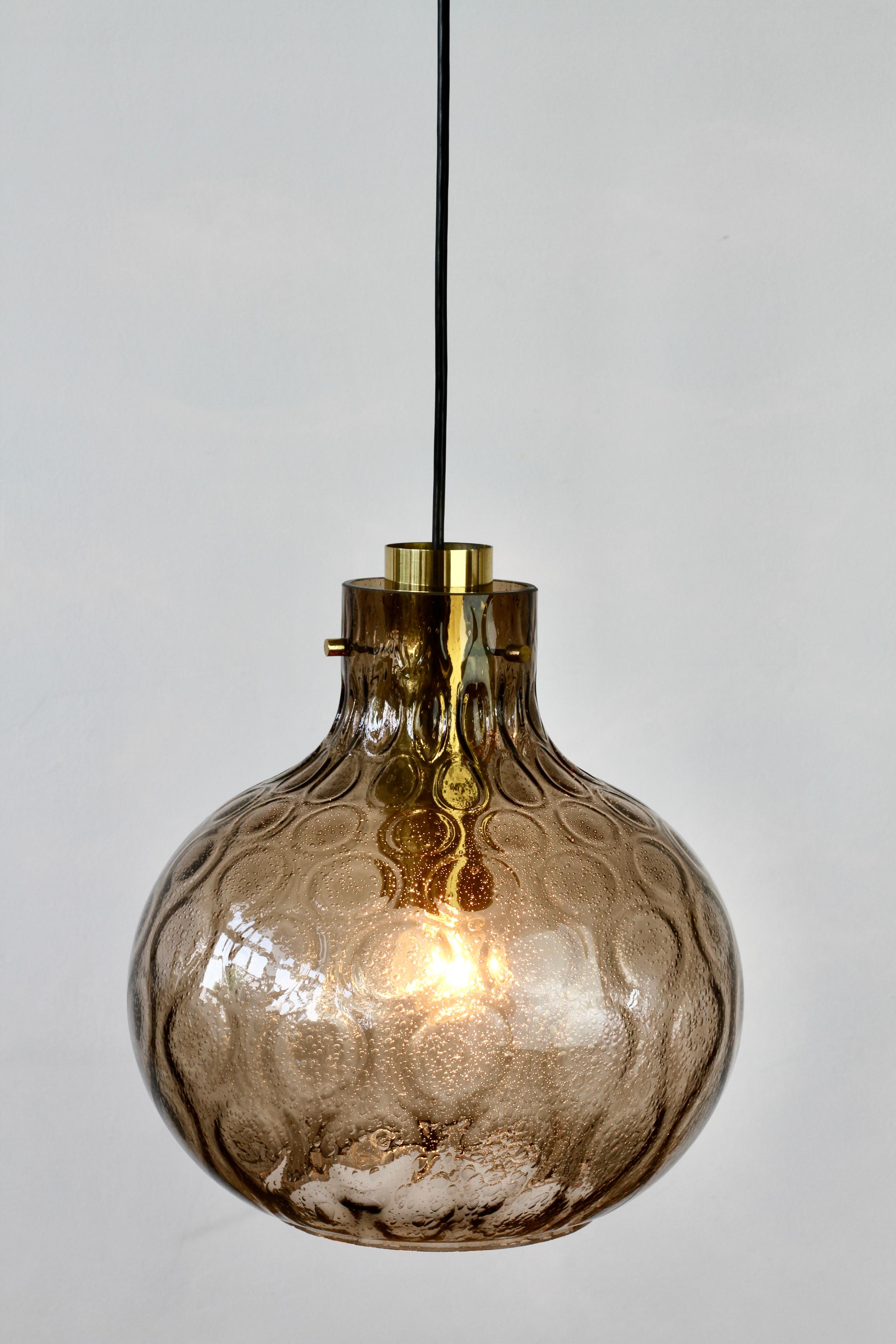 German 1 of 2 Large Vintage 1970s Bell Shaped Smoked Glass & Brass Globe Pendant Lights For Sale
