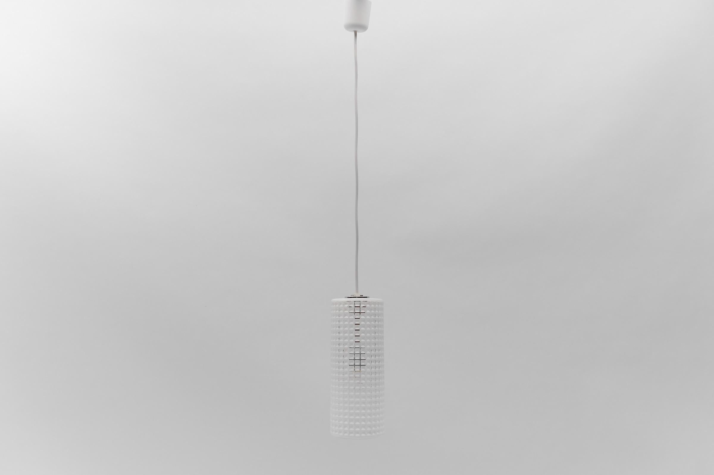 Vintage German pendant lamp in glass by Limburg. E27 socket. 

Height changeable by the cable. Maximum height is 100 cm, minimum 50 cm. Diameter 12 cm. From the 1960s.

The lamp is executed with an E27 Edison screw fit bulb. It is wired and in