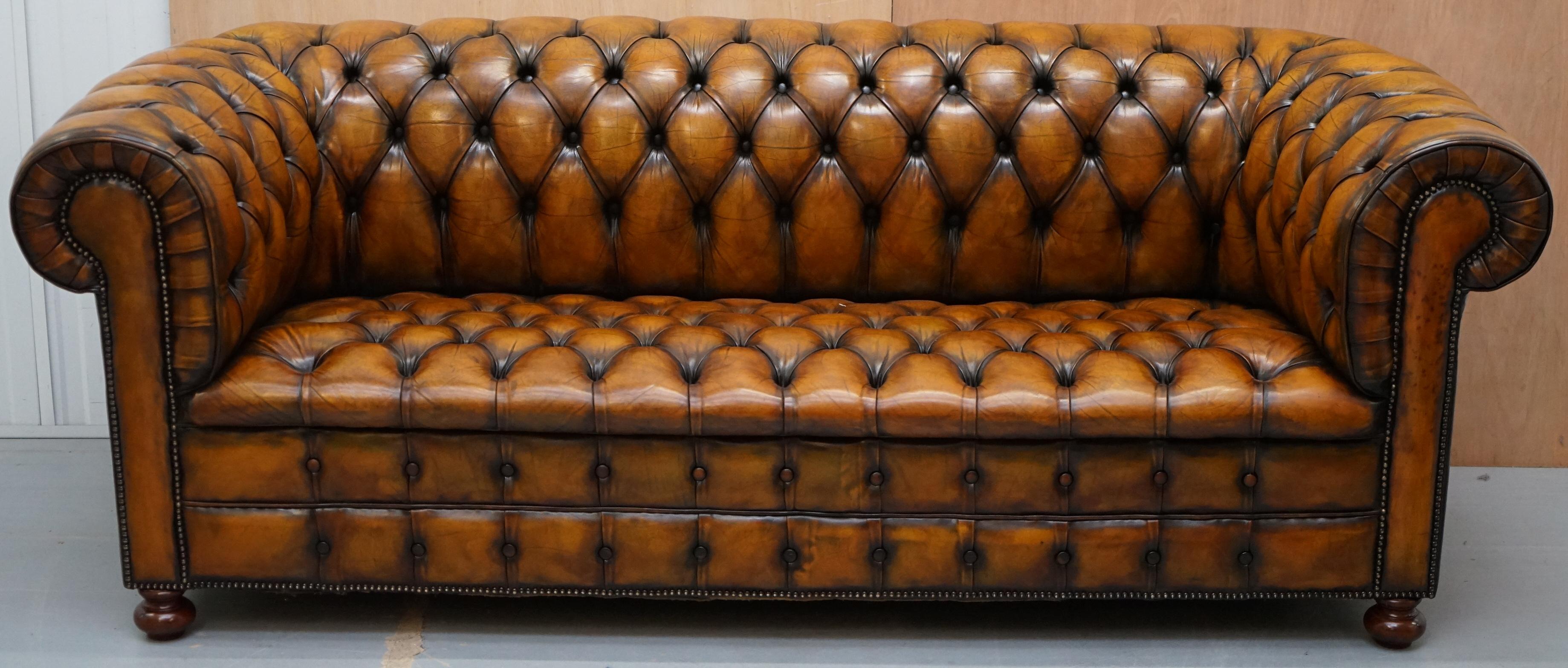 We are delighted to offer for sale 1 of 2 stunning rare original vintage Whisky brown leather Chesterfield club sofas in newly restored condition with fully buttoned base 

This sofa is one of a pair, I have another which is exactly the same model