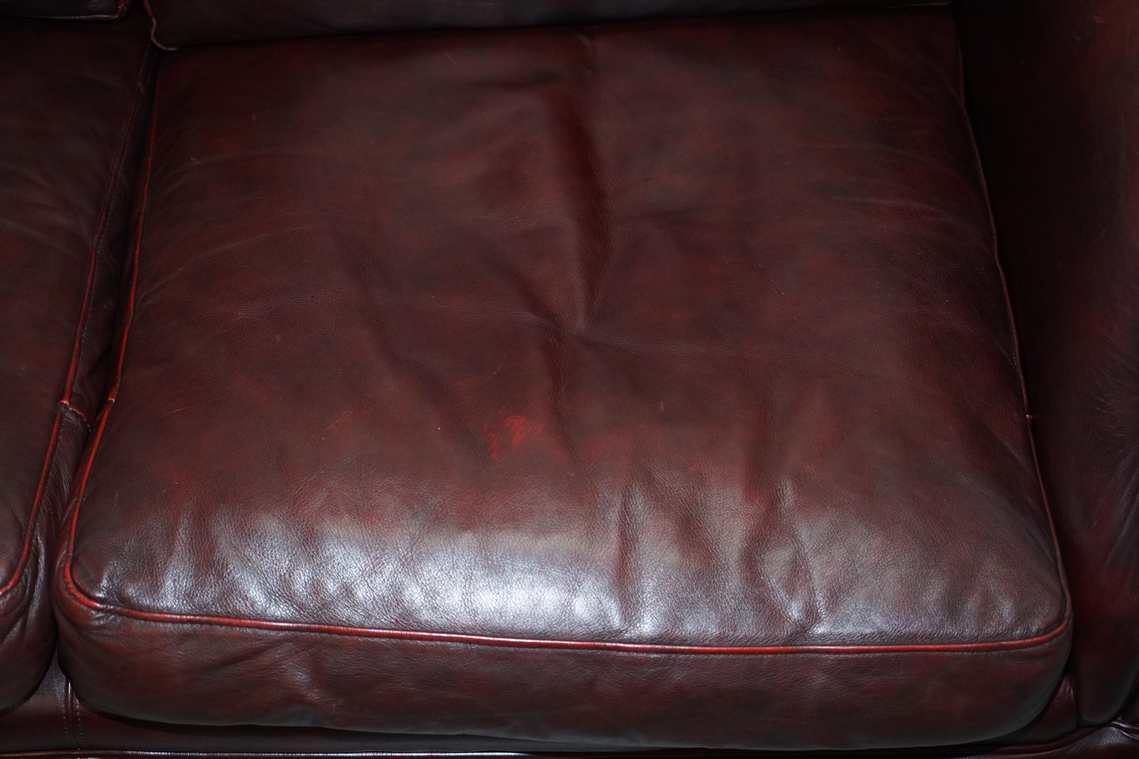 English 1 of 2 Lovely Thomas Lloyd Consort Oxblood Leather Three-Seat Sofas