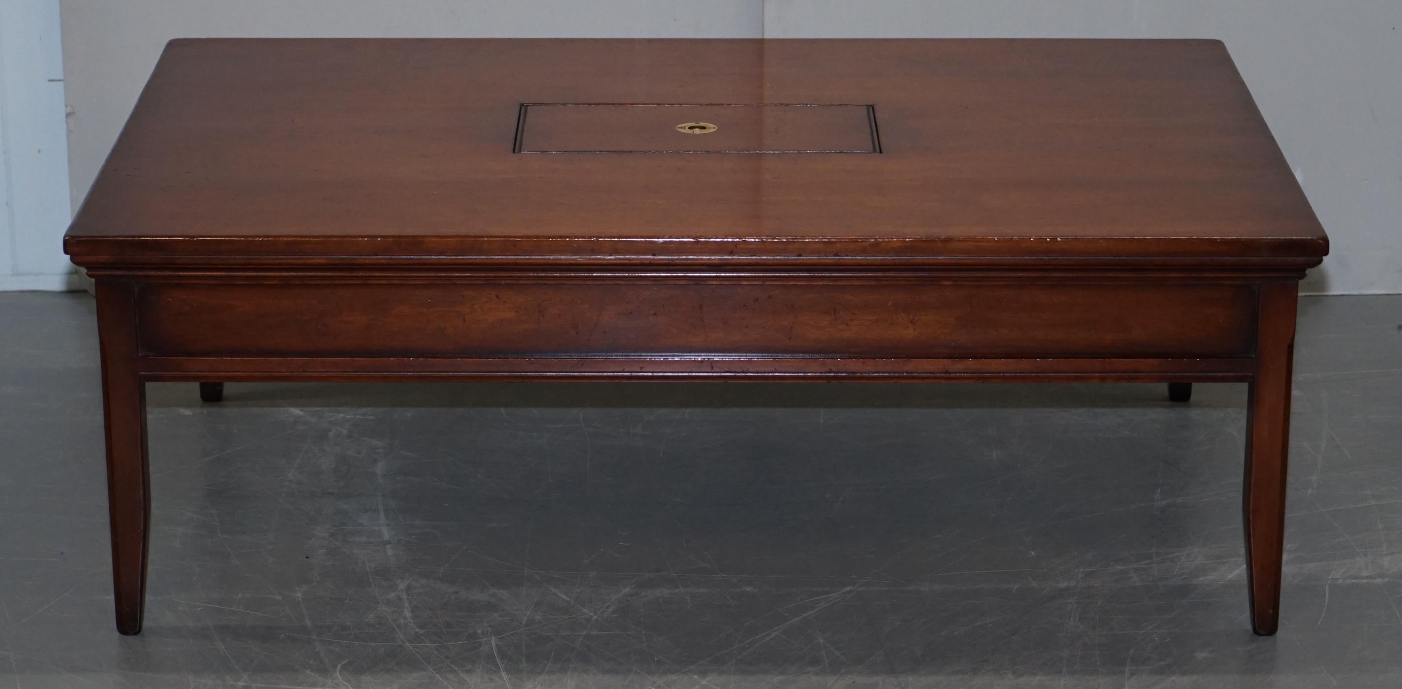 We are delighted to offer for sale 1 of 2 stunning solid mahogany Military Campaign coffee tables with internal storage made by REH Kennedy and retailed through Harrods London

This sale is for one, the matching table is listed under my other