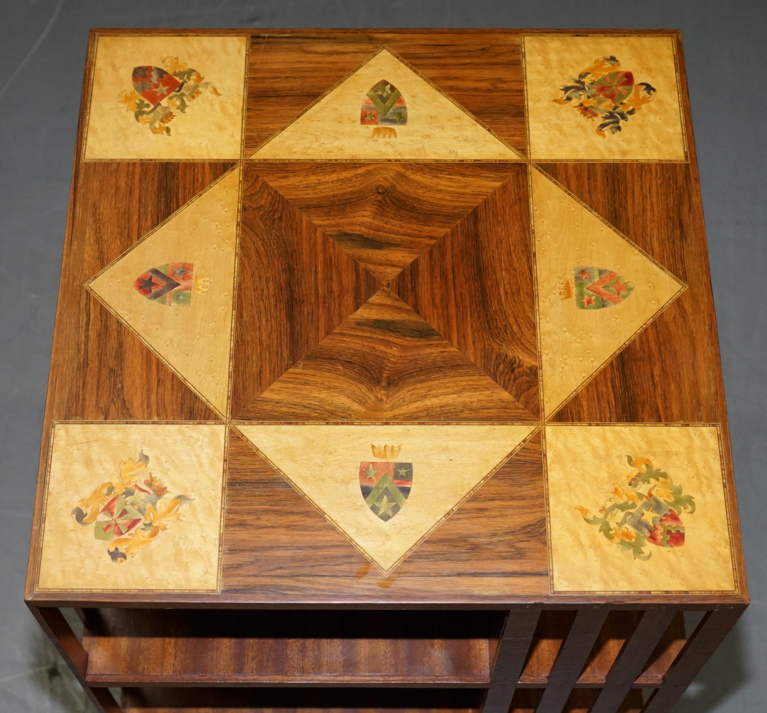 We are delighted to offer this stunning vintage Library bookcases inlaid with Royal Armorial cresting 

This is a real decorator’s piece, I have never seen a revolving bookcase with marquetry inlay before and any piece of furniture with armorial