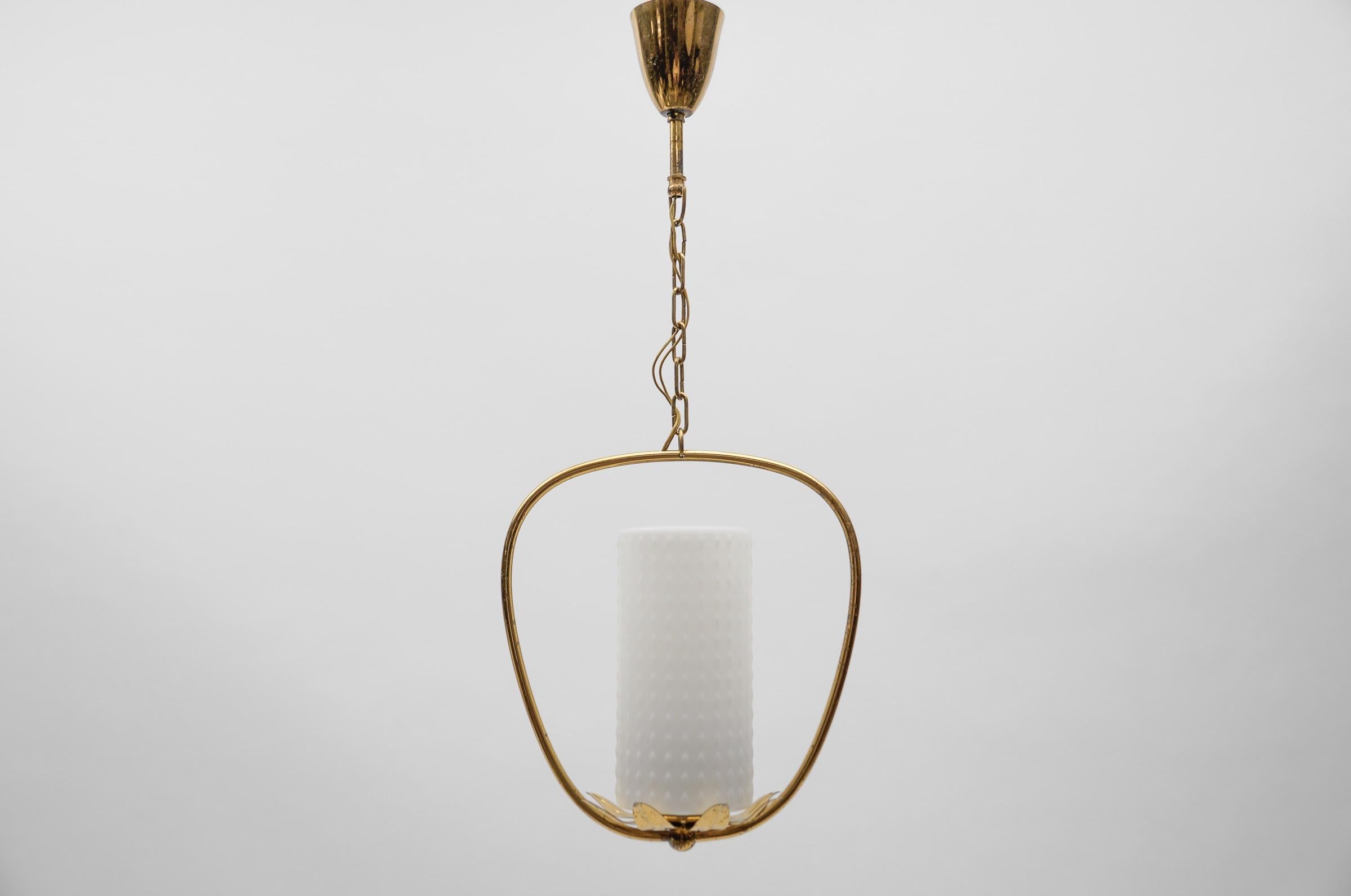 Lovely Mid Century Modern Brass & Bubble Glass Pendant Lamp by Rupert Nikoll, 1960s Austria / Wien

Dimensions
Width: 9.44 in. (24 cm)
Height: 22.04 in. (56 cm)
Depth: 5.51 in. (14 cm)

One E27 socket. Works with 220V and 110V.

Our lamps are