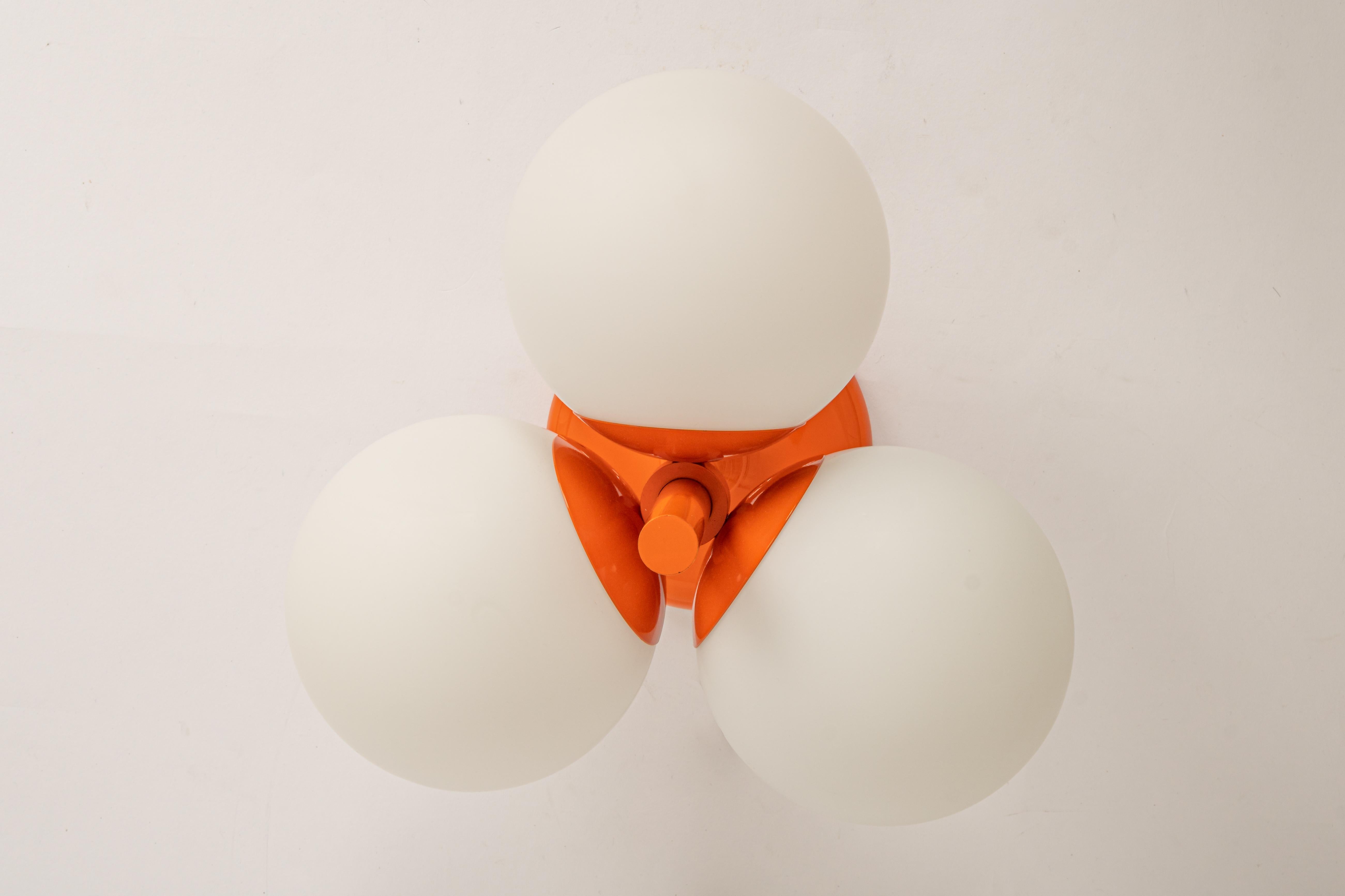 1 of 2 Midcentury Orbital Ceiling /Wall Lamp in Orange by Kaiser, Germany, 1970s In Good Condition In Aachen, NRW
