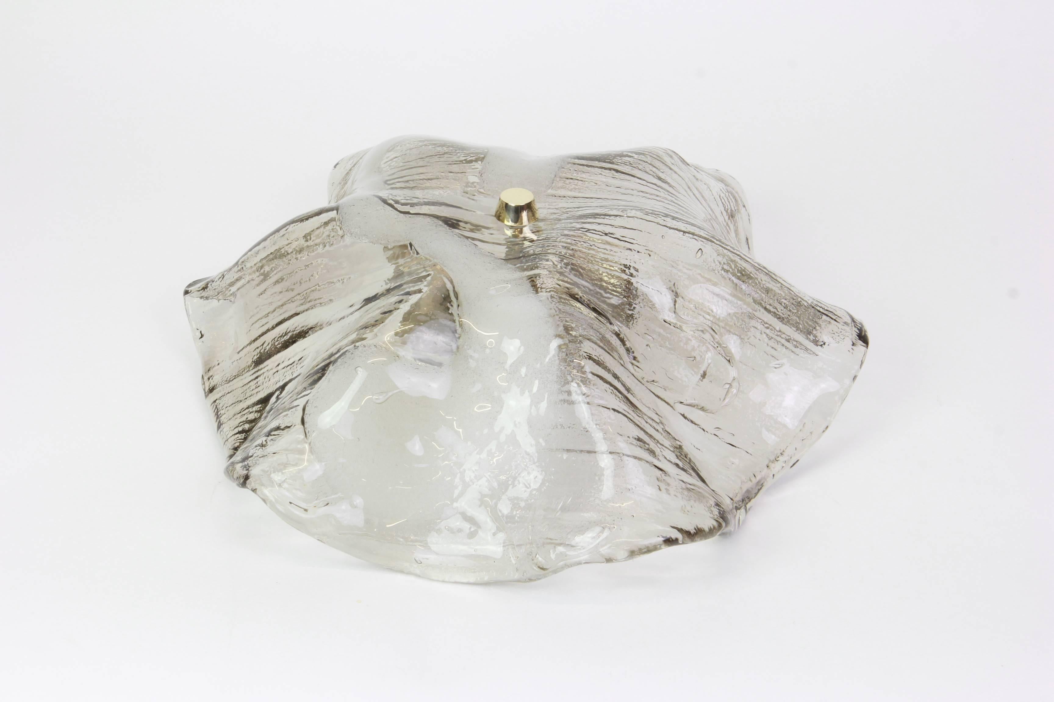 1 of 2 flush mount lights designed by Kalmar, Austria, 1970s
Wonderful large organic Murano glass or bi-colored clear and amber or smoked.

High quality and in very good condition. Cleaned, well-wired and ready to use. 

Each fixture requires 3