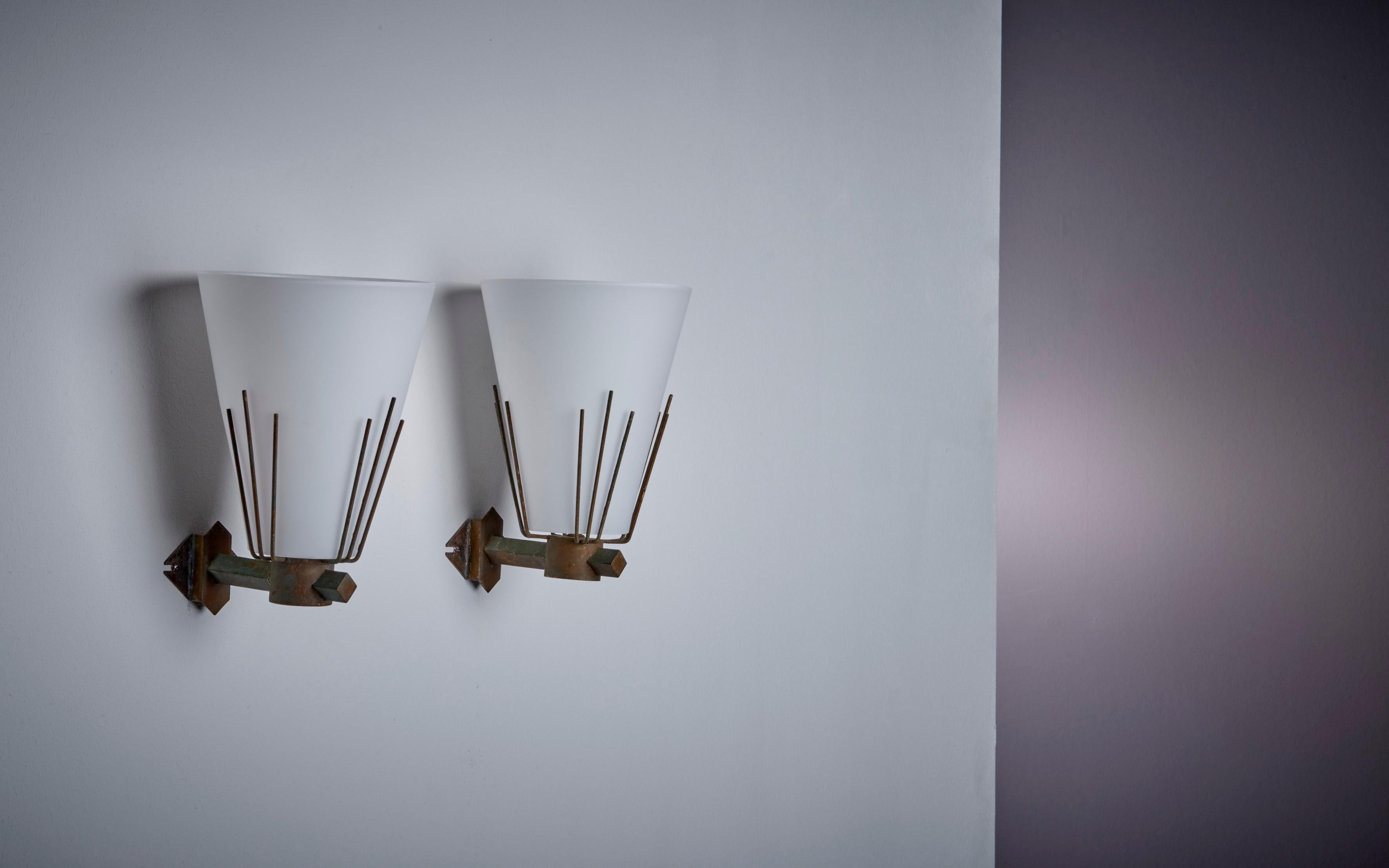 Pair of Wall Lamps in Glass and Brass, Italy - 1950s. Price is per pair, two pairs available.
Please note: Lamp should be fitted professionally in accordance to local requirements. 1xE14 each