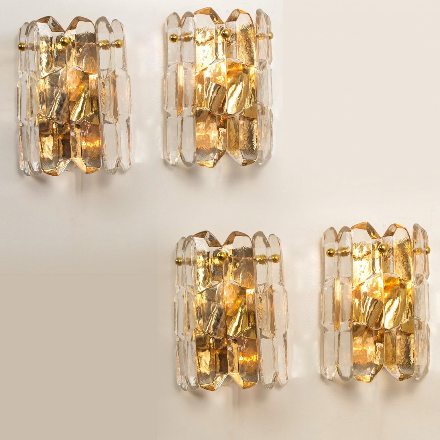 Pair of high-end and handmade  brass wall lights made by Kalmar in Austria. This model 