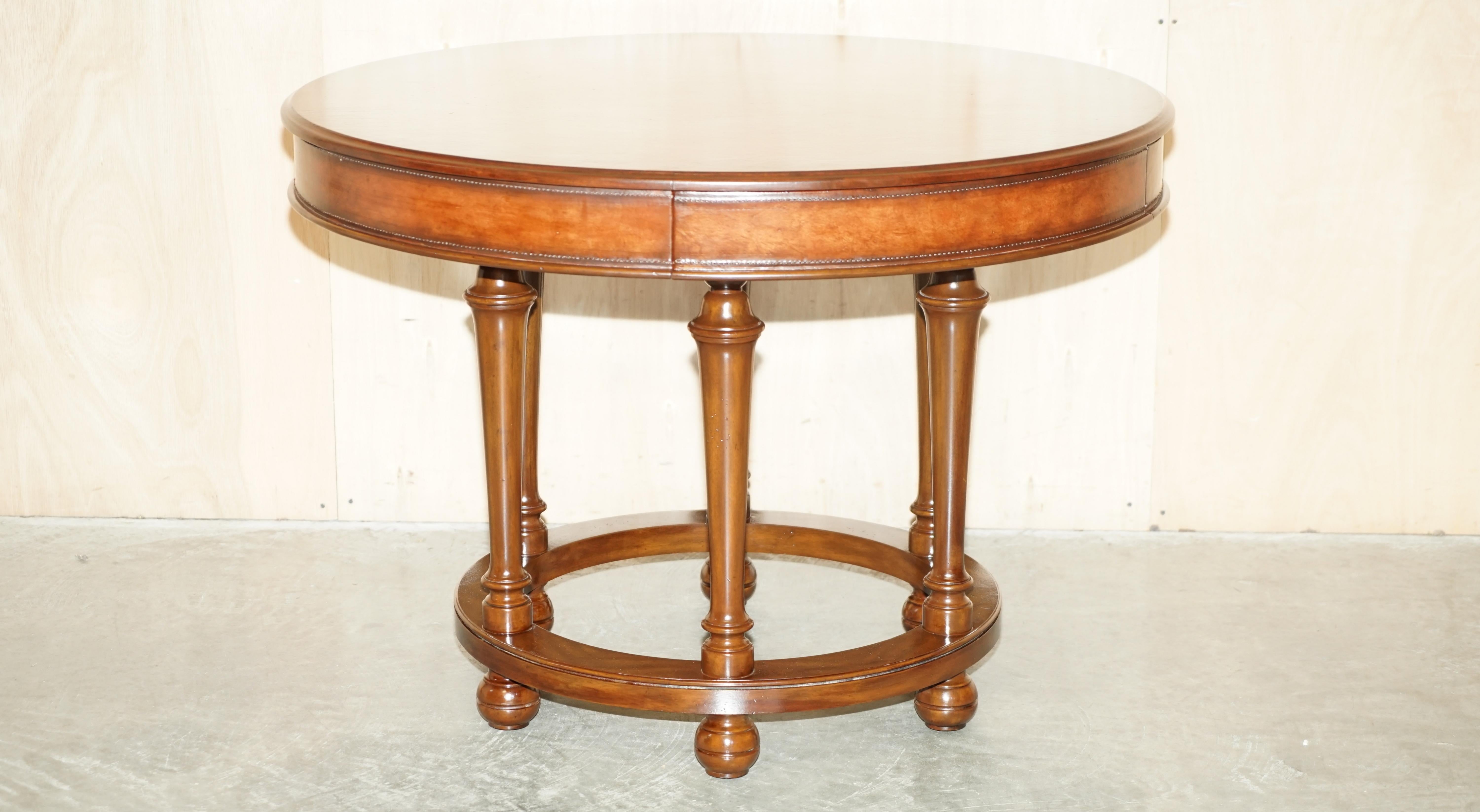 We are delighted to offer for sale this very nice and well made RRP £11,000 Ralph Lauren centre table with hand stitched brown leather sides which is one of a pair

This sale is for one table, I have an exacting matching table listed under my