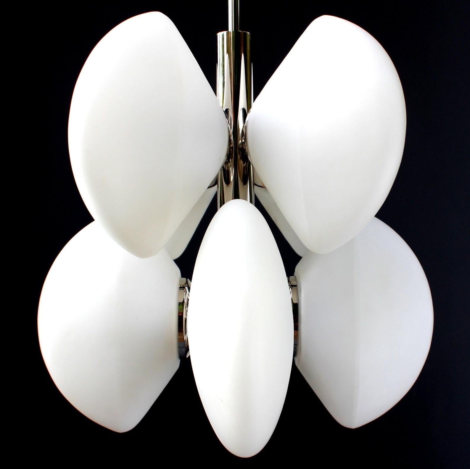 Petit organic chandelier 1970s with 8 (+1 for reserve) oval opal glass globes by Kaiser Germany.

Measures: diameter 13