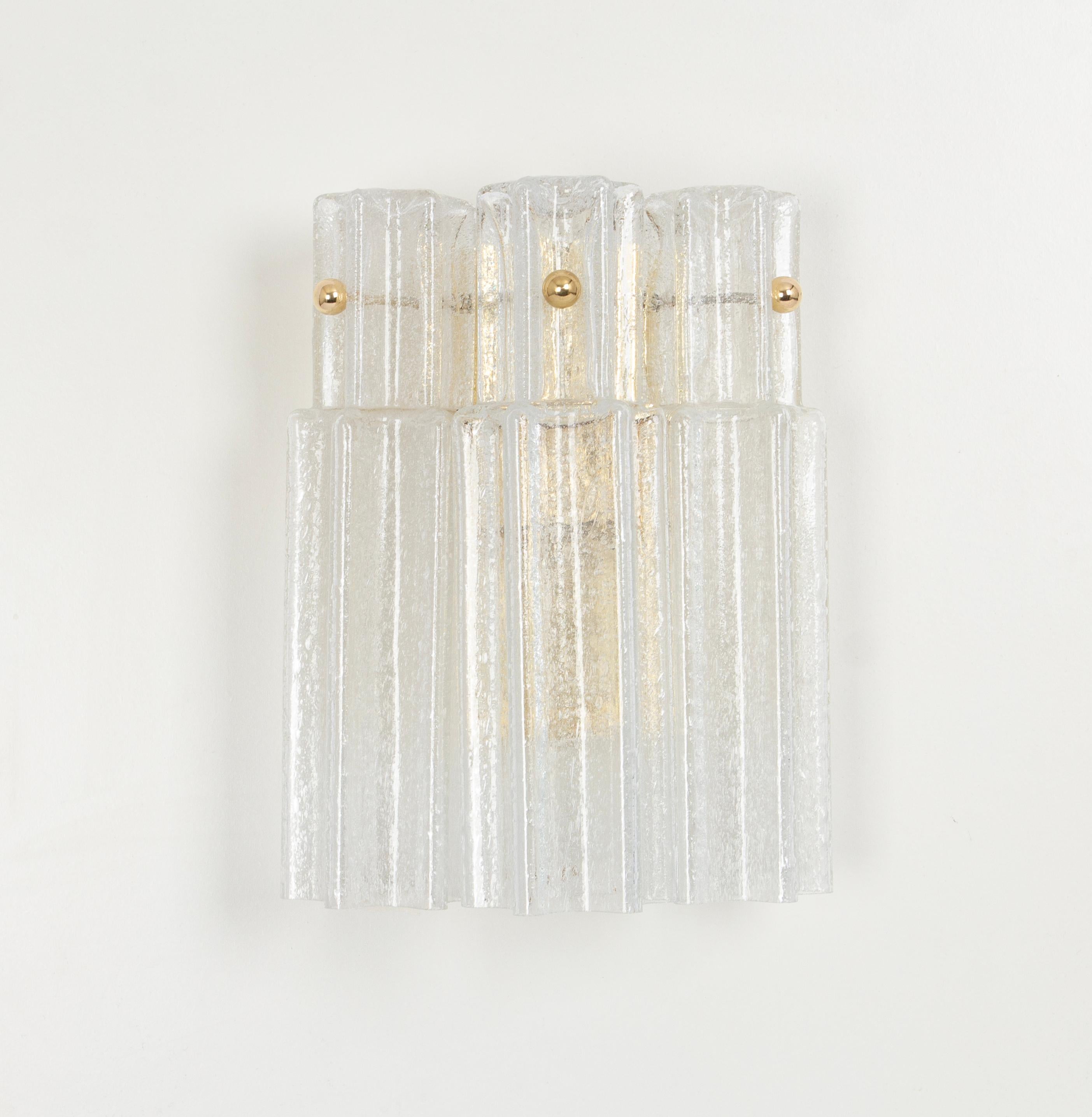Beautiful wall light with 3 frosted glasses on a brass frame-design by Glashütte Limburg, Germany. Manufactured in midcentury, circa 1960.
High quality and in very good condition. Cleaned, well-wired and ready to use. 

The fixture requires one