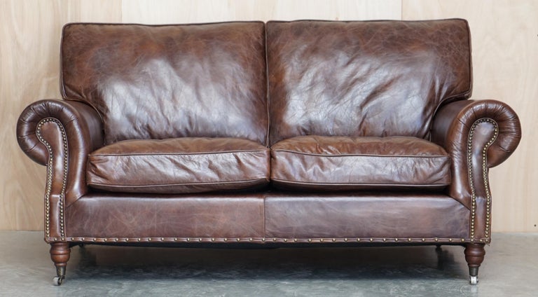 We are delighted to offer for sale this absolutely stunning original Timothy Oulton Balmoral hand dyed brown leather sofa

This sofa is the 2.5 seat version at 176cm wide which can seat upto three, I have the larger 204cm seat version listed under