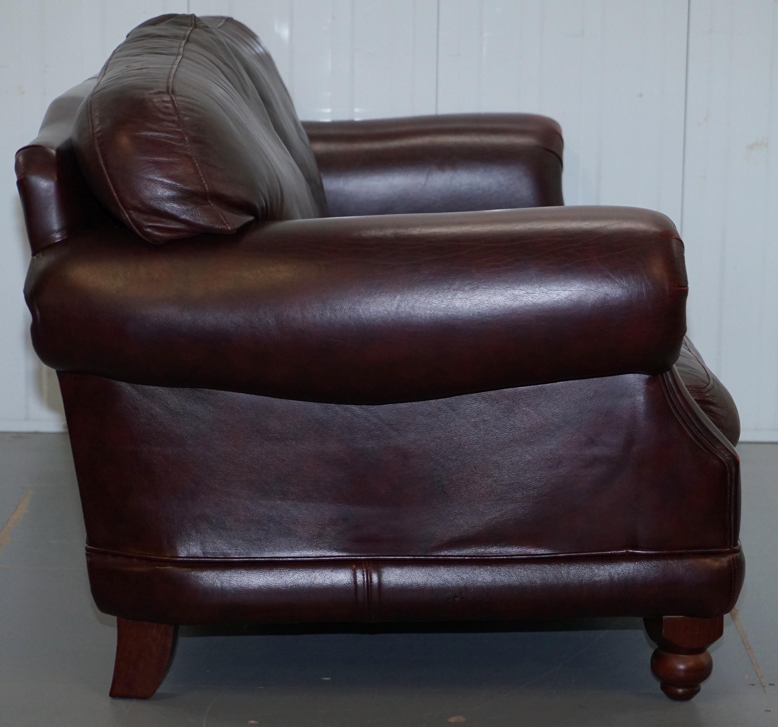 1 of 2 Thomas Lloyd Consort Oxblood Leather Three-Seat Sofas 1