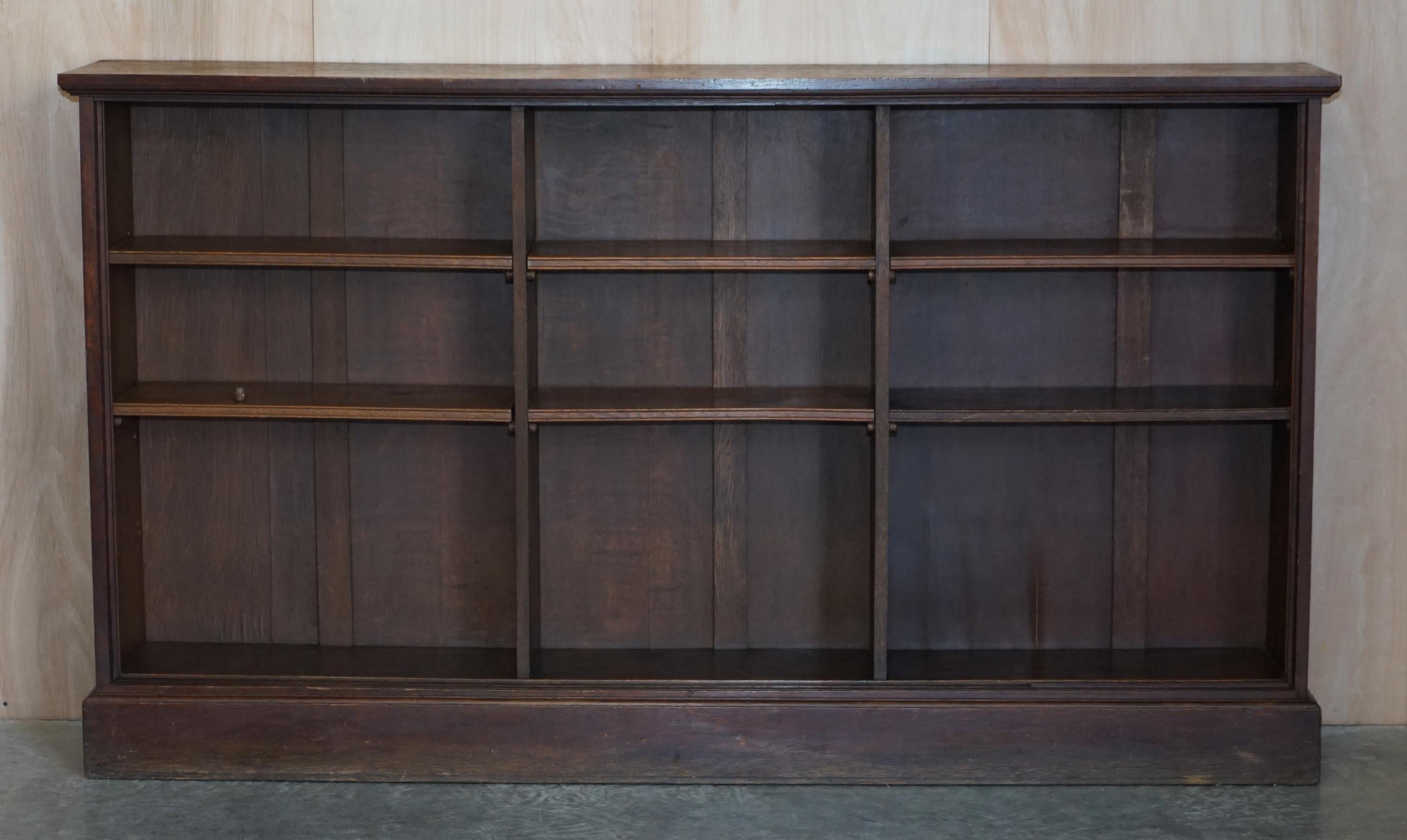 We are delighted to offer for sale 1 of 2 large dwarf open library bookcases circa 1880 in English oak

As mentioned this is one of two, the other is 60cm smaller than this one and is listed under my other items, it is not included in this
