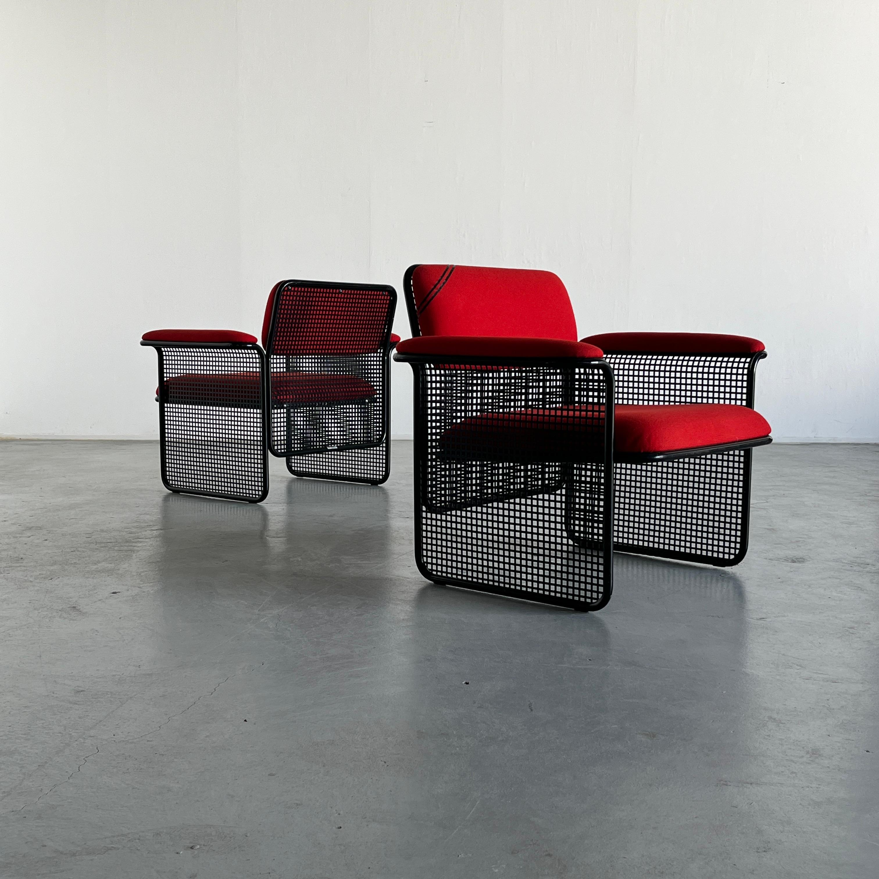 Vintage Italian postmodern wire armchairs.
Manufactured by Talin, Padova. Produced in Italy during the 1970s.

The chairs are in very good vintage condition. The upholstery has no noticeable staining . The black metal frame shows some scratches and