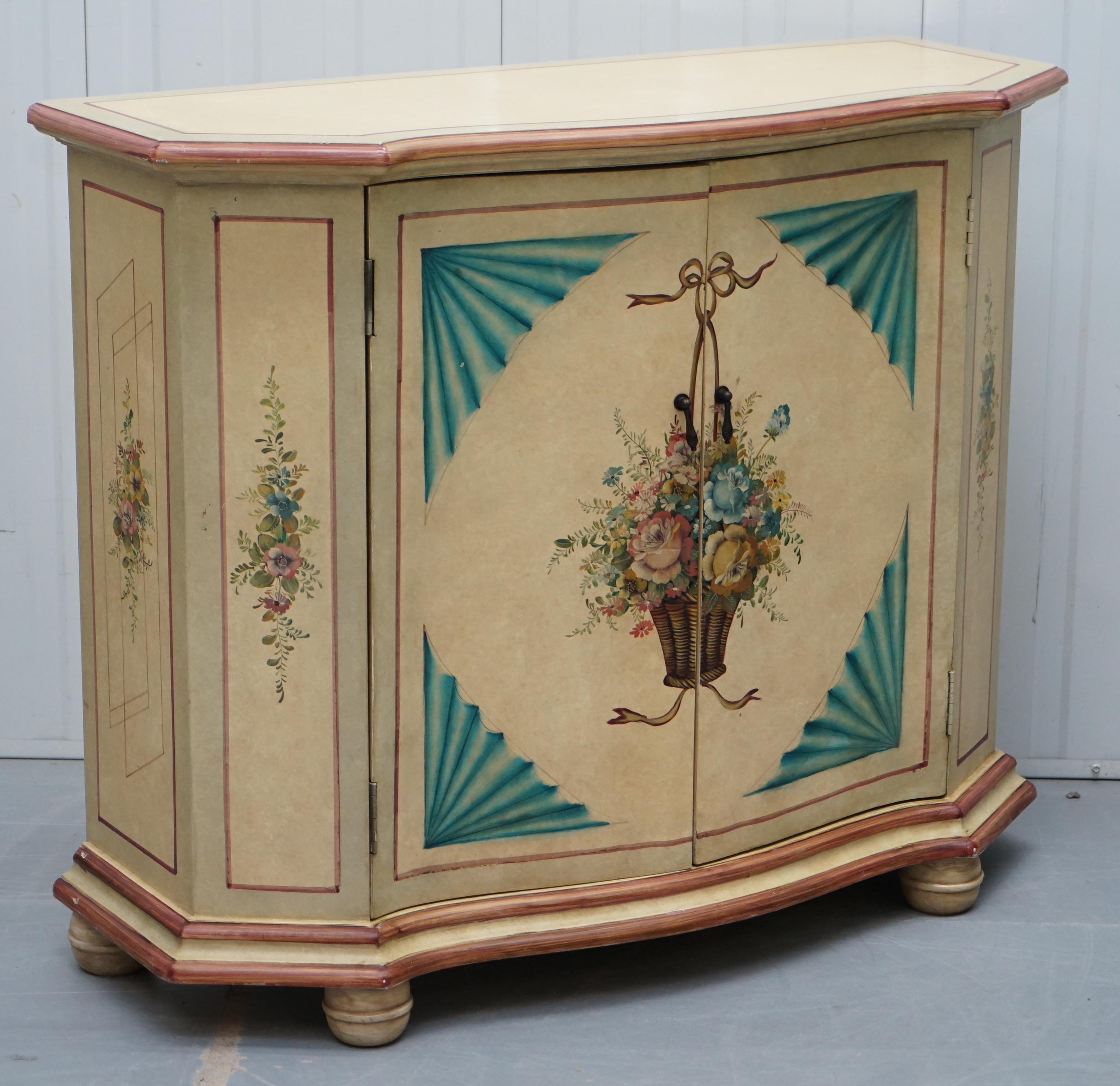 We are delighted to offer for sale one of two stunning hand painted serpentine fronted sideboard cupboards

The second one is listed under my other items, it’s the same size and style with different paintings

Both are expertly executed, they