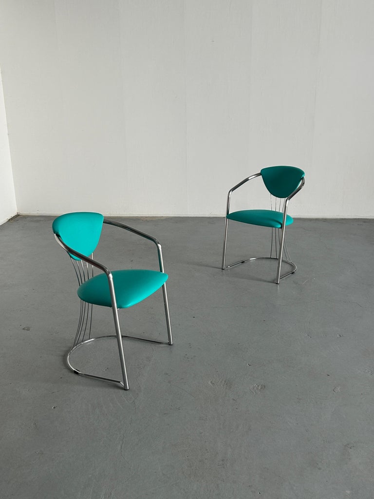 1 of 2 Vintage Steel and Mint Green Faux Leather Dining Chairs by