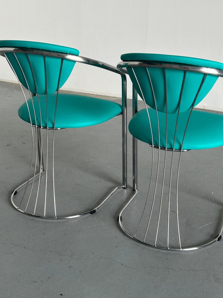 1 of 2 Vintage Steel and Mint Green Faux Leather Dining Chairs by