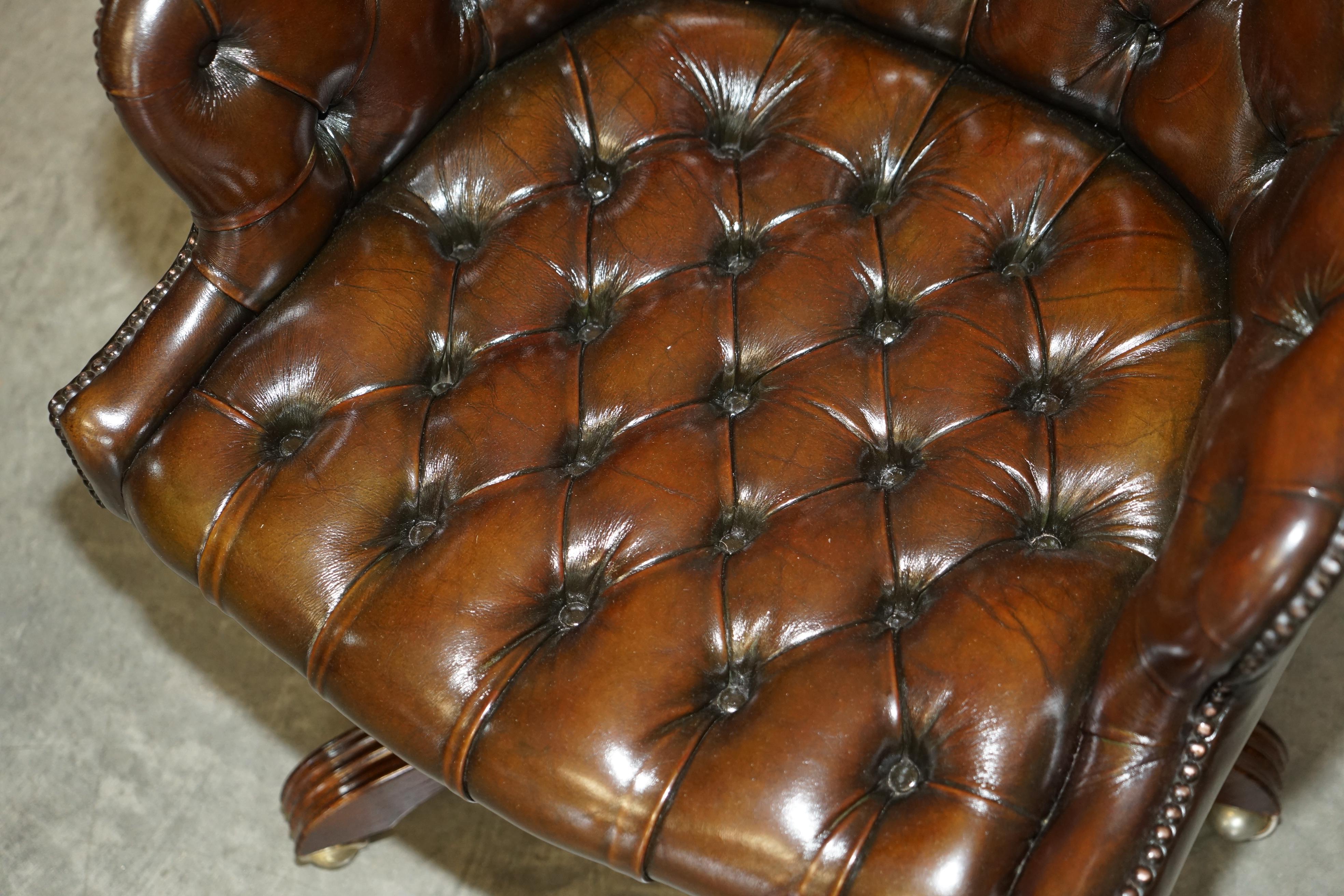 Hand-Crafted 1 of 2 Wade England Restored Chesterfield Swivel Brown Leather Captains Chairs