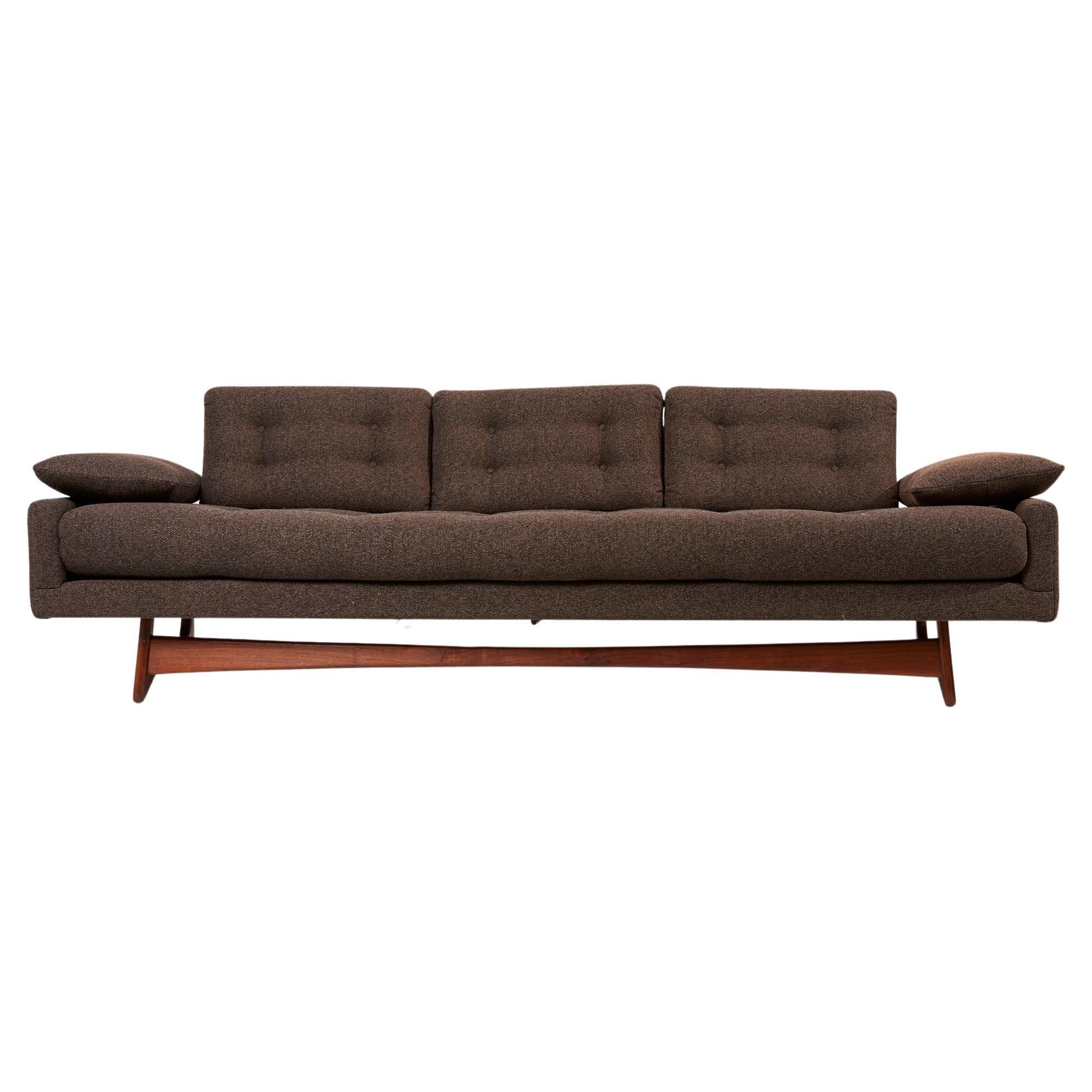 Iconic sofa model 2408 / 'Gondola' sofa by Adrian Pearsall for Craft Associates, 1950s. One of the sofa's distinctive features is its beautiful open structure with a partly open back rest and and a sculptural walnut frame. New upholstered in Kvadrat