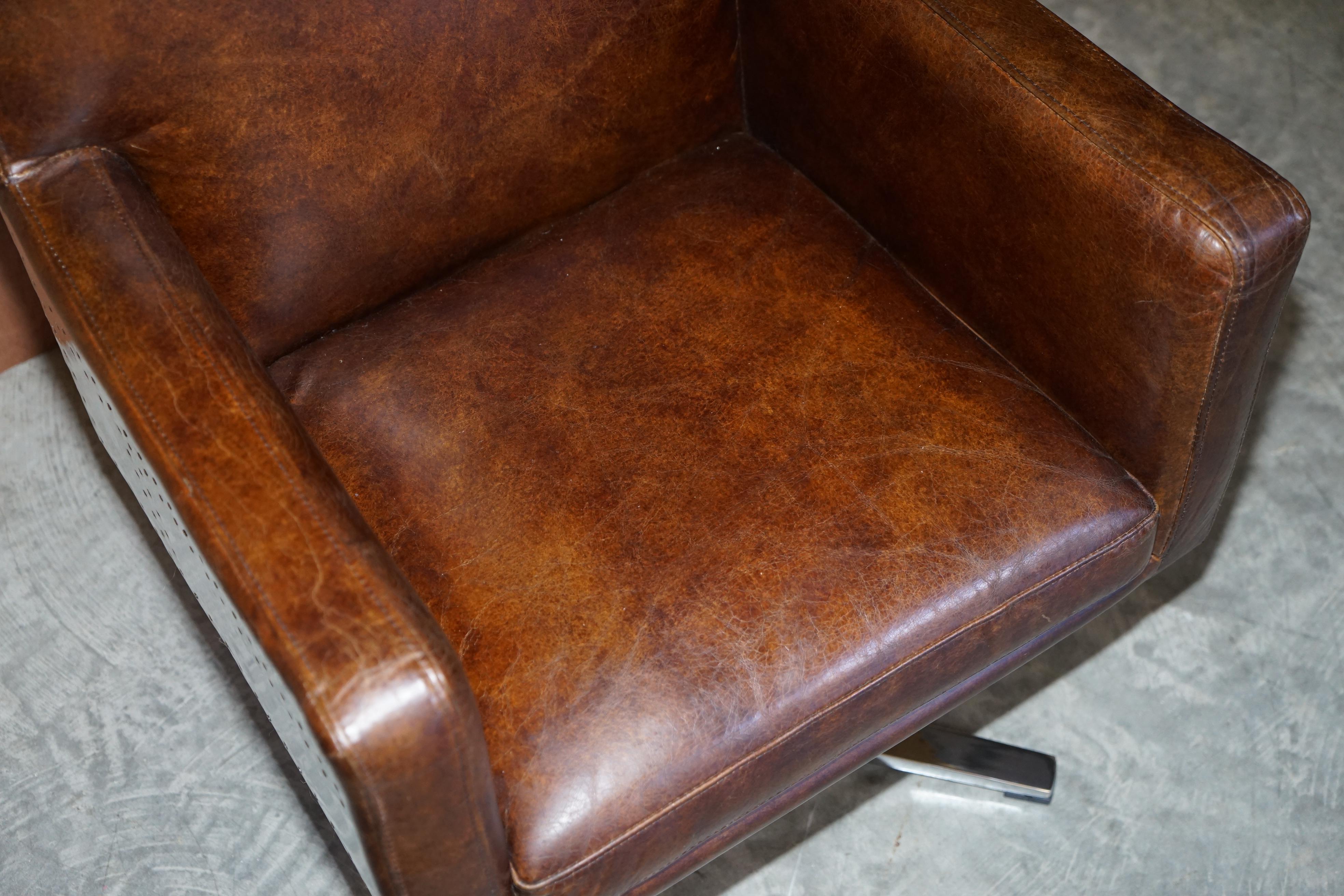 20th Century 1 of 2 Hand Dyed Brown Leather Aviator Hammered Metal Swivel Captains Armchairs For Sale