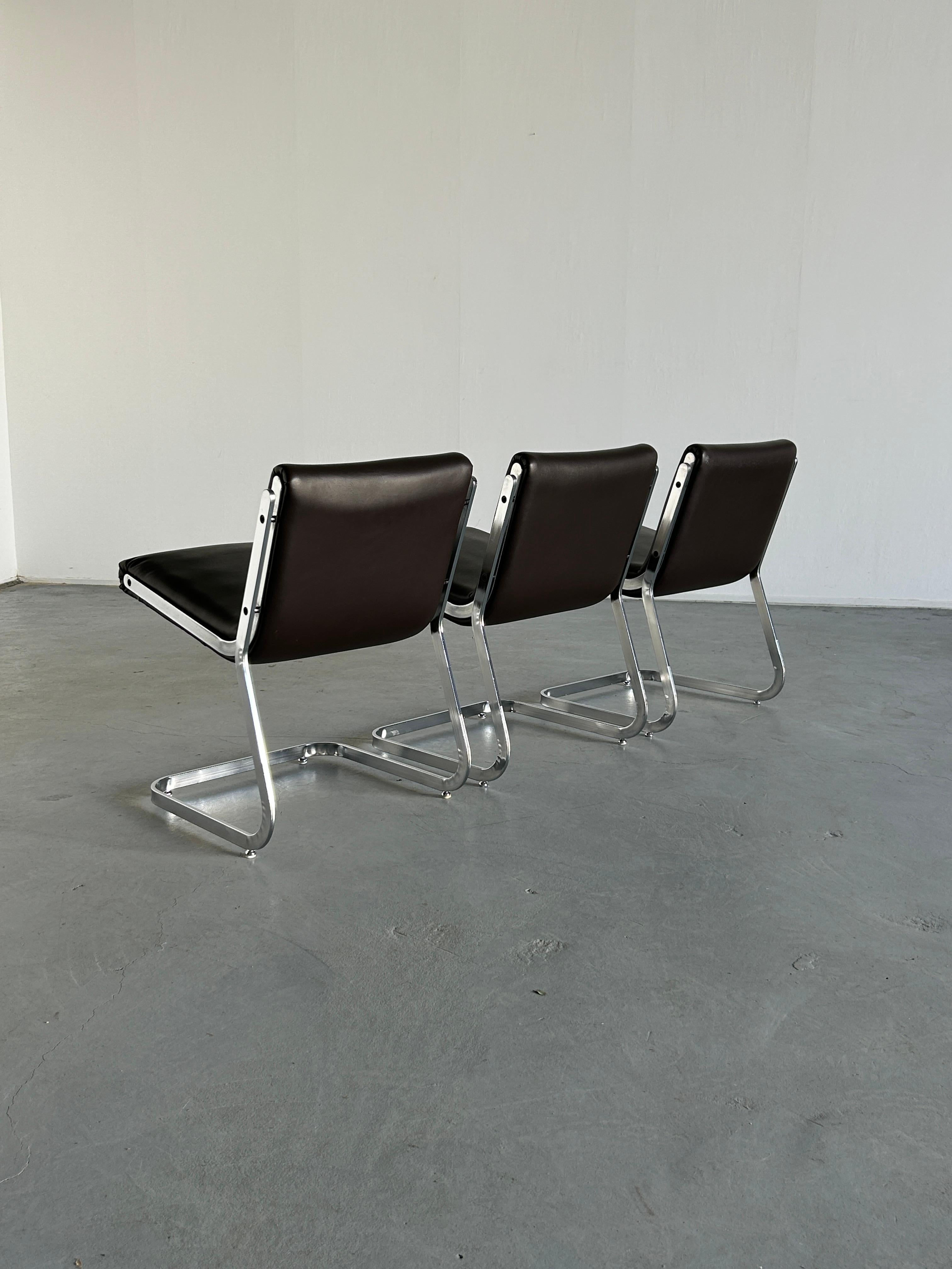 1 of 3 Italian Space Age Cantilever Lounge Chairs in Steel and Faux Leather, 70s For Sale 1