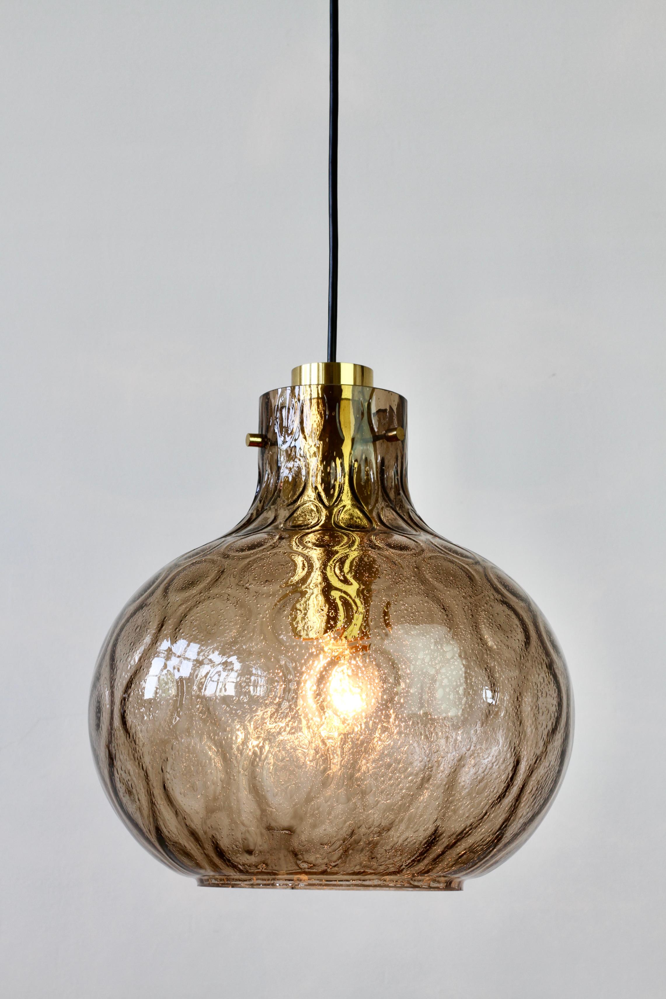 German 1 of 3 Large Vintage 1970s Bell Shaped Smoked Glass & Brass Globe Pendant Lights For Sale