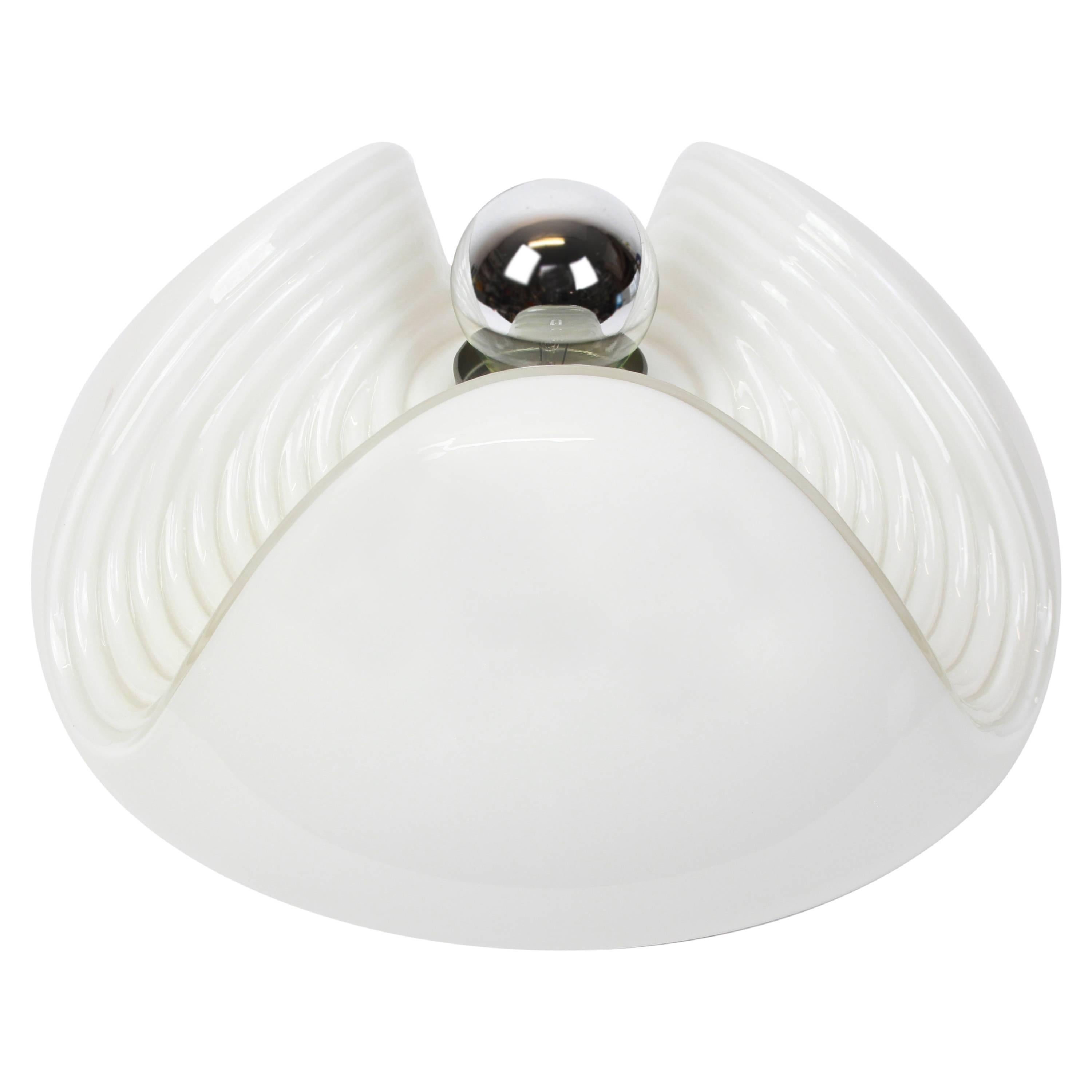 A special round biomorphic white glass wall sconce or flushmount designed by Koch & Lowy for Peill & Putzler, manufactured in Germany, circa the 1970s.

High quality and in very good condition. Cleaned, well-wired and ready to use. 

Each