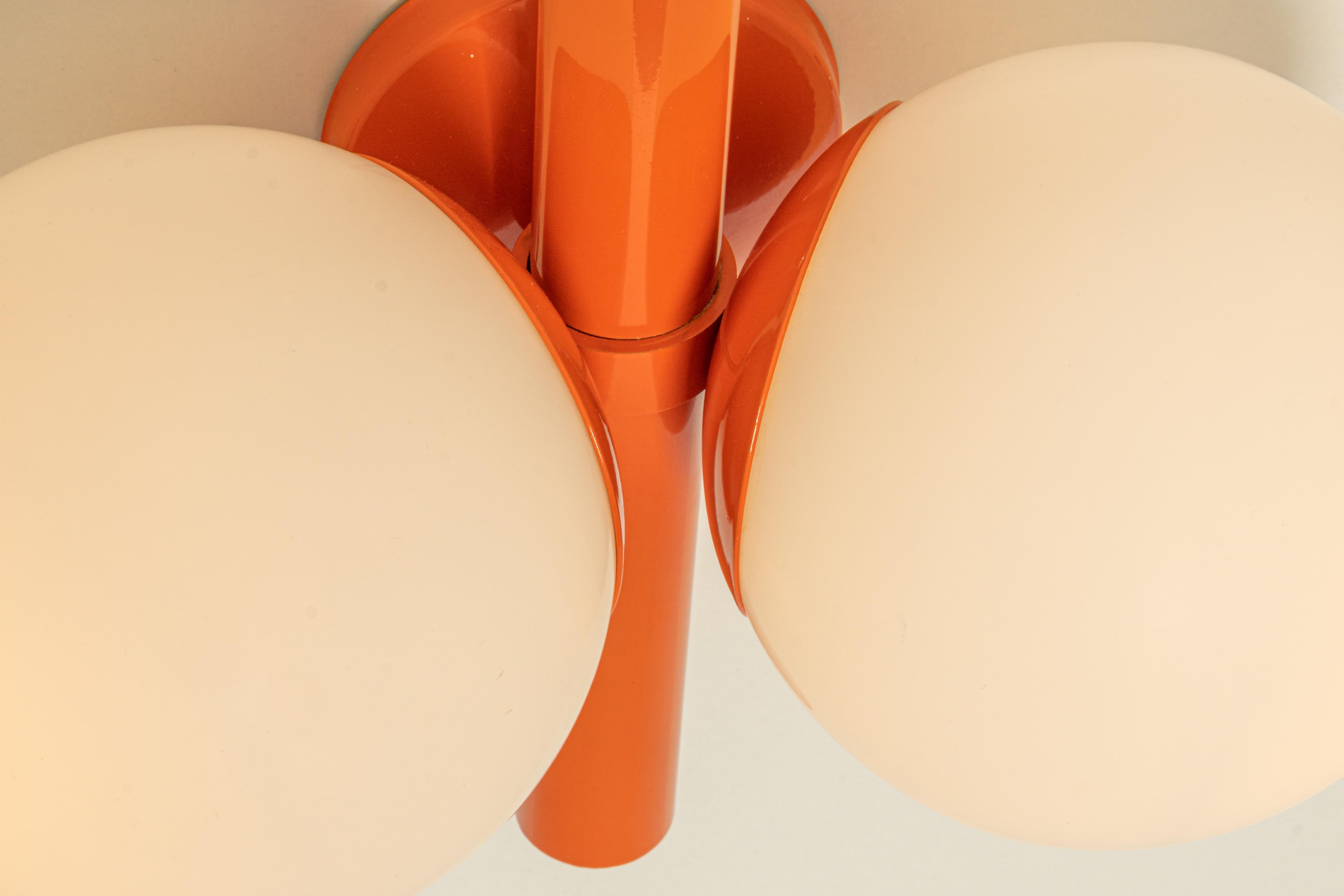 1 of 3 Midcentury Orbital Wall lights in Orange by Kaiser, Germany, 1970s For Sale 2