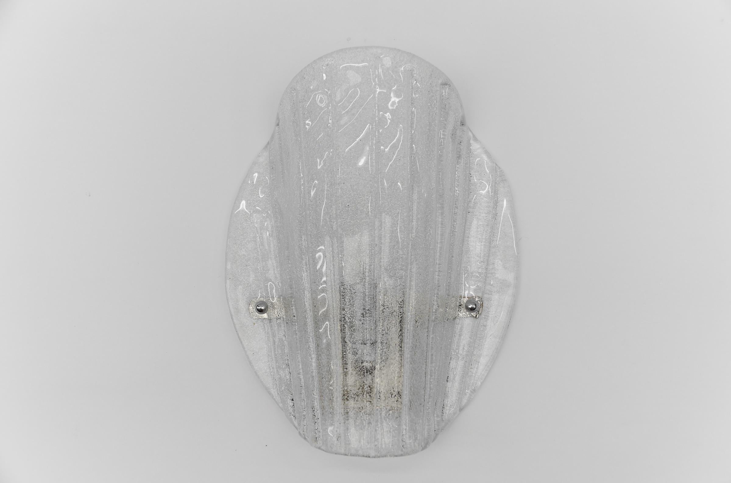 1 of 3 Murano Glass Sconce  Wall Lamp, 1960s

The wall lamp come with 1 x E14 / E15 Edison screw fit bulb holder, is wired and in working condition. It runs both on 110/230 Volt. Delivery without bulb.

Our lamps are checked, cleaned and are