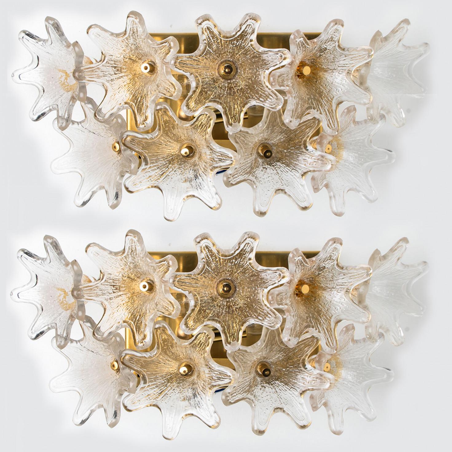 One of the three pairs of light fixtures by Paolo Venini for VeArt, Italy, 1960s. Brass hardware. Several star shaped clear resembles flowers. The fixture illuminates beautifully on wall.

Exceptional pieces and in this quantity extreme rare to