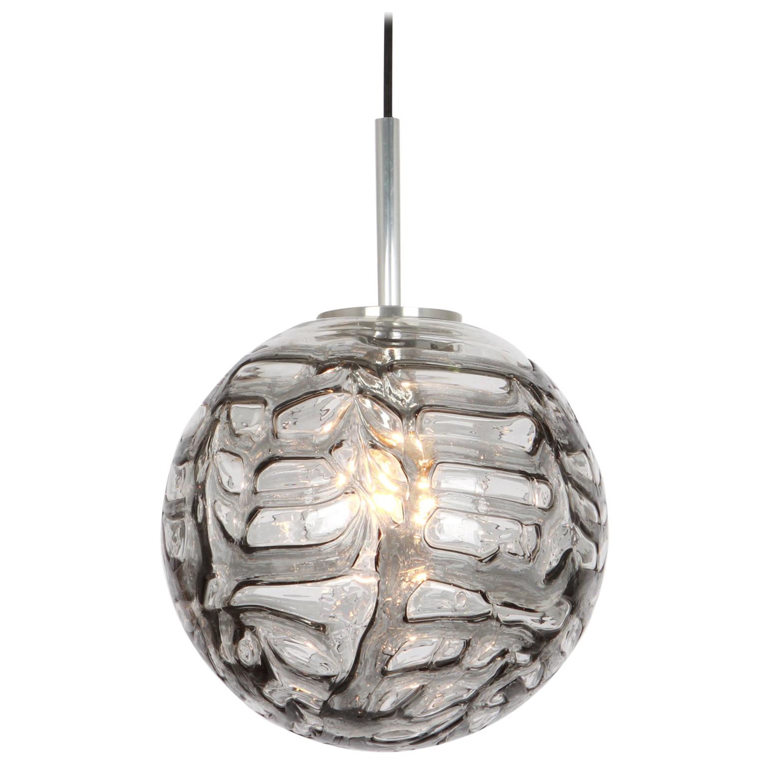 Doria ceiling light with large volcanic Murano glass ball.
High quality of materials, gives a wonderful light effect when it is on.

Sockets: One E27 standard bulbs. Max 100 Watts.
Light bulbs are not included. It is possible to install this