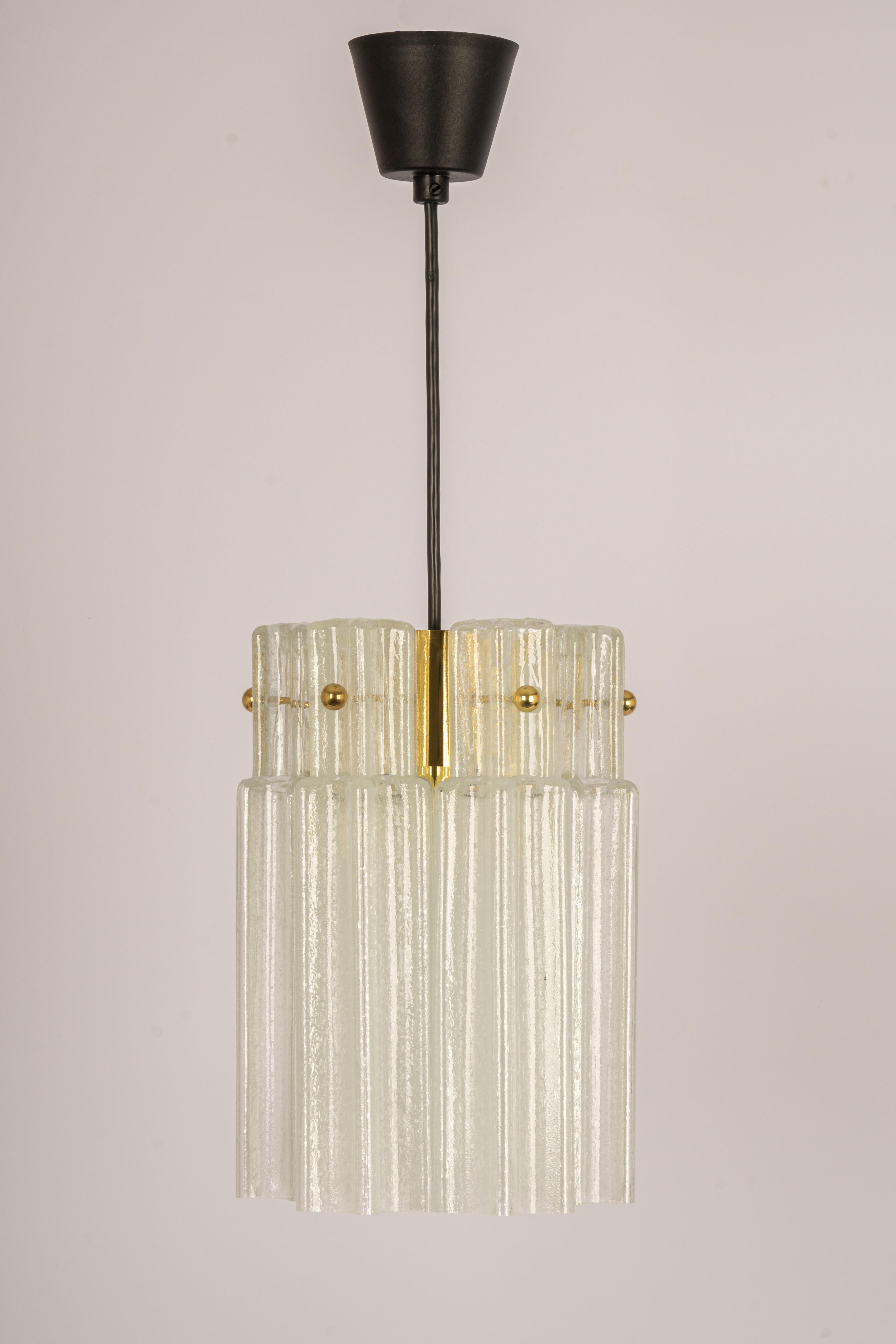 1 of 3 Pendant lights with hand-blown glass pieces on a brass base made by Glashütte Limburg.

Best of the 1970s from Germany.
High quality and in very good condition. Cleaned, well-wired, and ready to use. 

The fixture requires 1 x E27