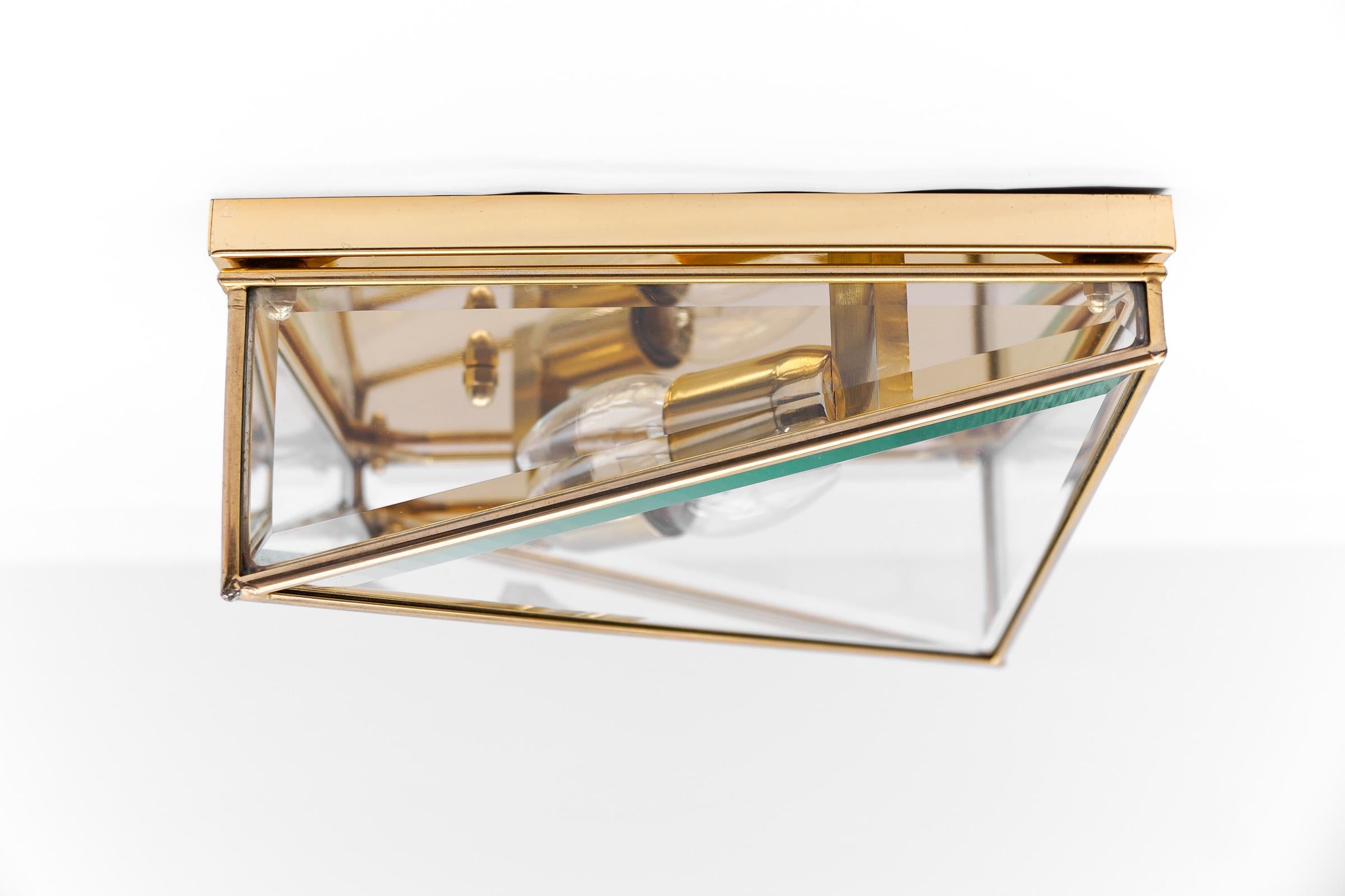 1. of 3 Very Elegant Cut Glass Asymetric Flush Mount, Italy 1960s

The fixture need 2 x E14 standard bulb.

Light bulbs are not included.
It is possible to install this fixture in all countries (US, Australia, Asia, UK, Europe,..)