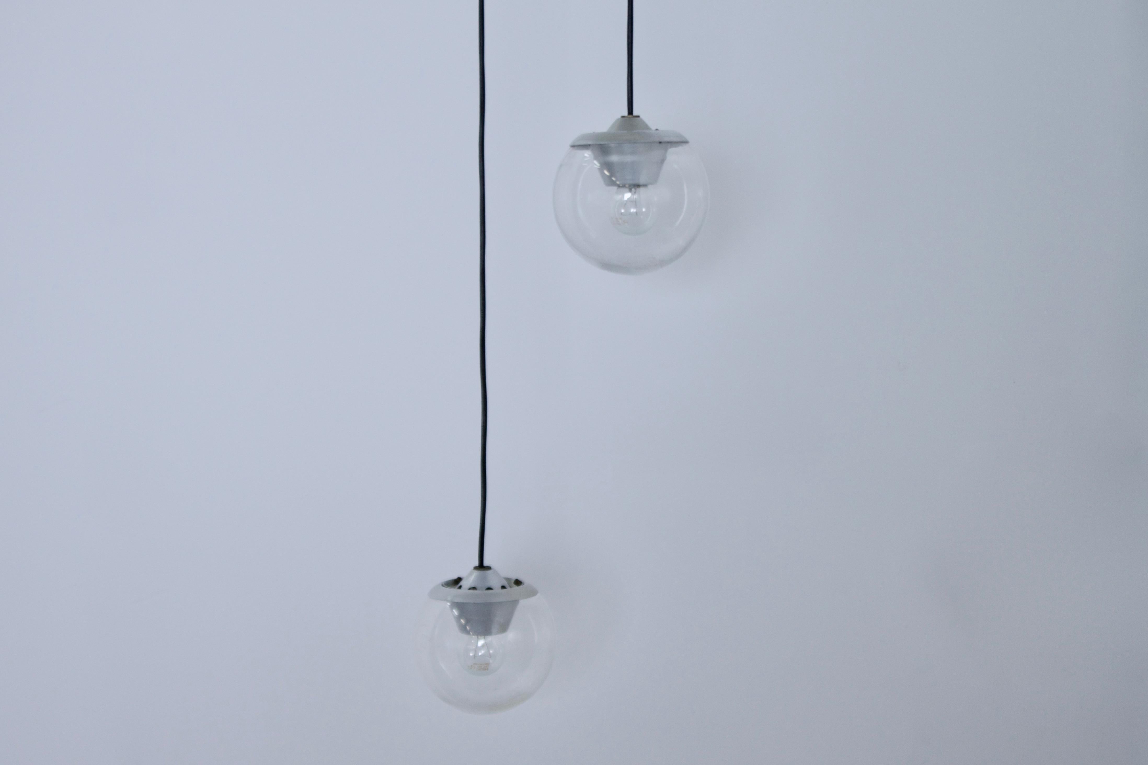 Beautiful original model 2095/1 pendants in very good original condition.

Designed by Gino Sarfatti in 1958.

Manufactured by Arteluce, Italy.

There are 35 of these pendants available.

The lamps have an aluminum shade holder which holds a