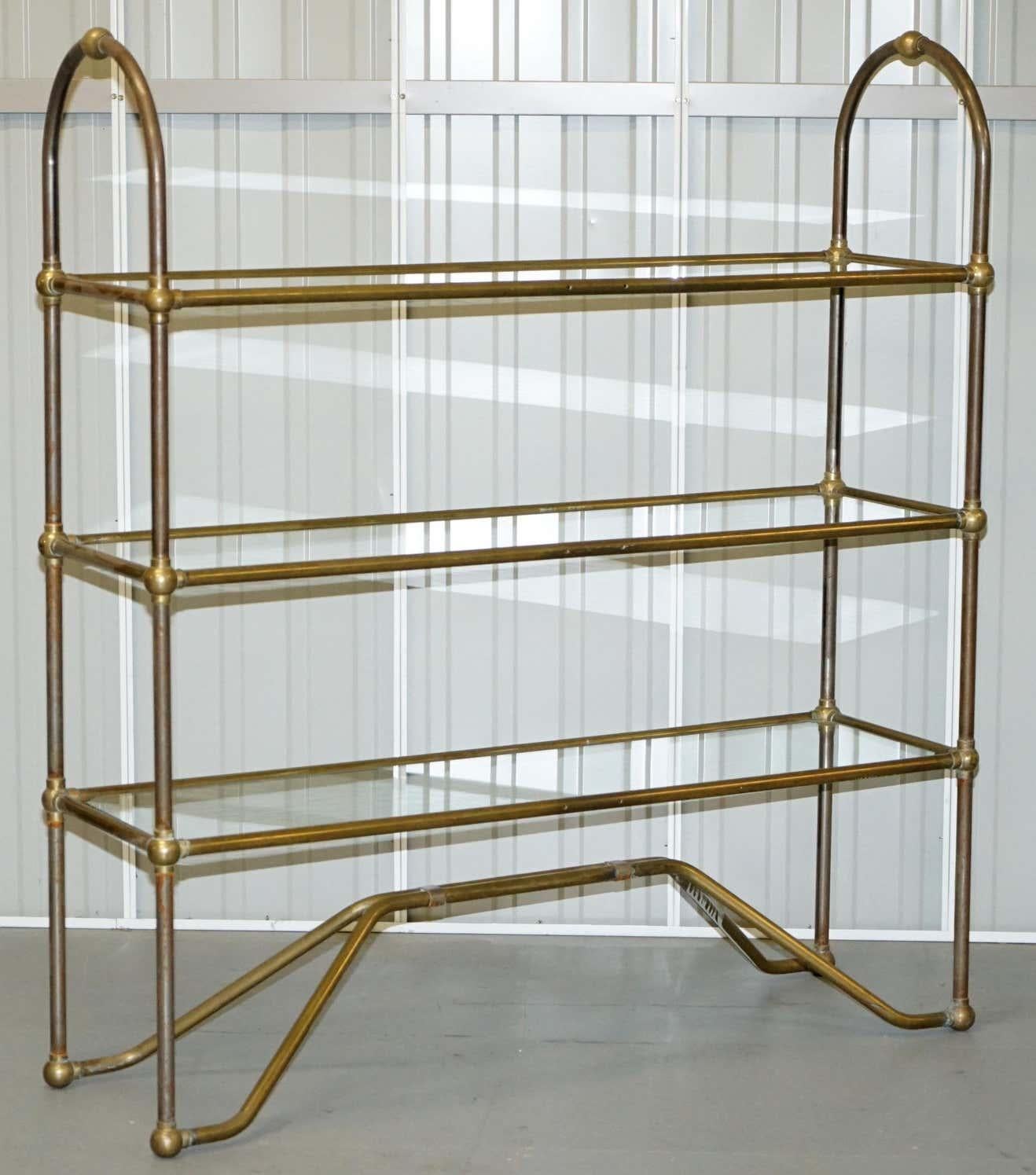 We are delighted to offer 1 of 4 exceedingly rare original 1930’s Art Deco Bronze and Steel Liberty’s of London display racks which are part of a larger suite

This sale is for one piece with the option to buy four of this size, I also have two