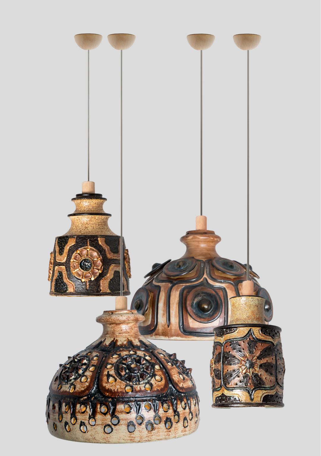 Playful arrangement of stunning round hanging lamps with an unusual shape, made with rich terra colored brown ceramics, manufactured in the 1970s in Denmark. We have a multitude of unique colored ceramic light sets and arrangements, all available in