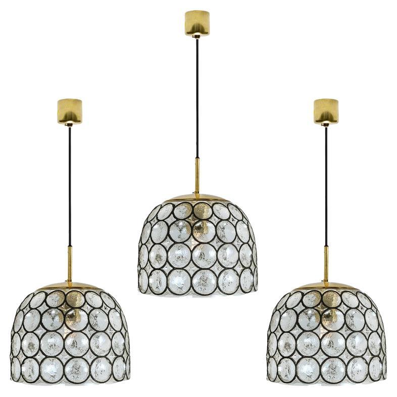 1 of 4 Circle Iron and Bubble Glass Chandeliers, Limburg For Sale