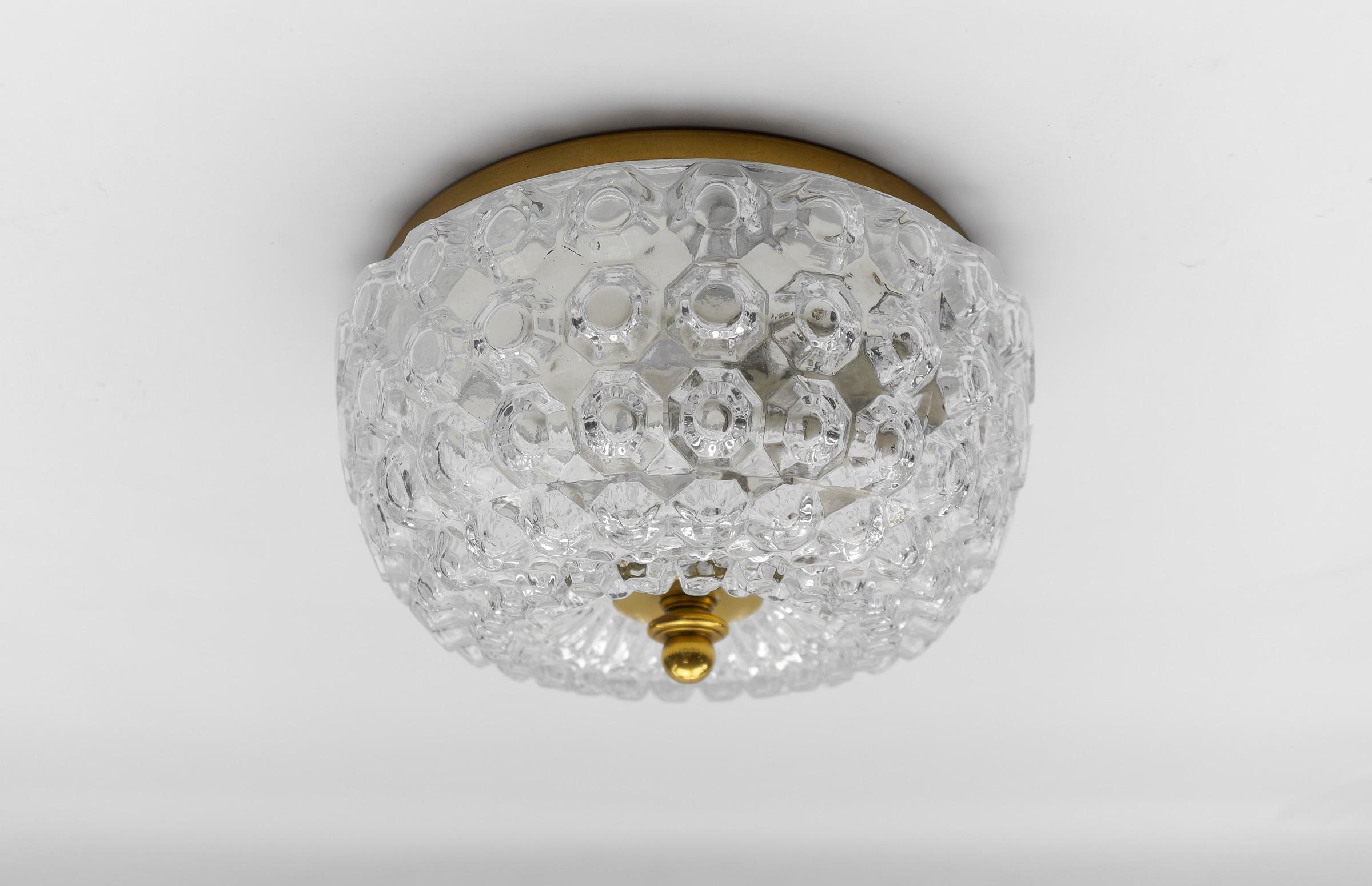 1 of 4 Elegant Flush Mount Lamp in Glass by Limburg, Gerrmany 1960s

We have four different sizes of the same model with 4 pieces per size which can also be found here on the platform.

The fixture need 1 x E27 standard bulb.

Light bulbs are not