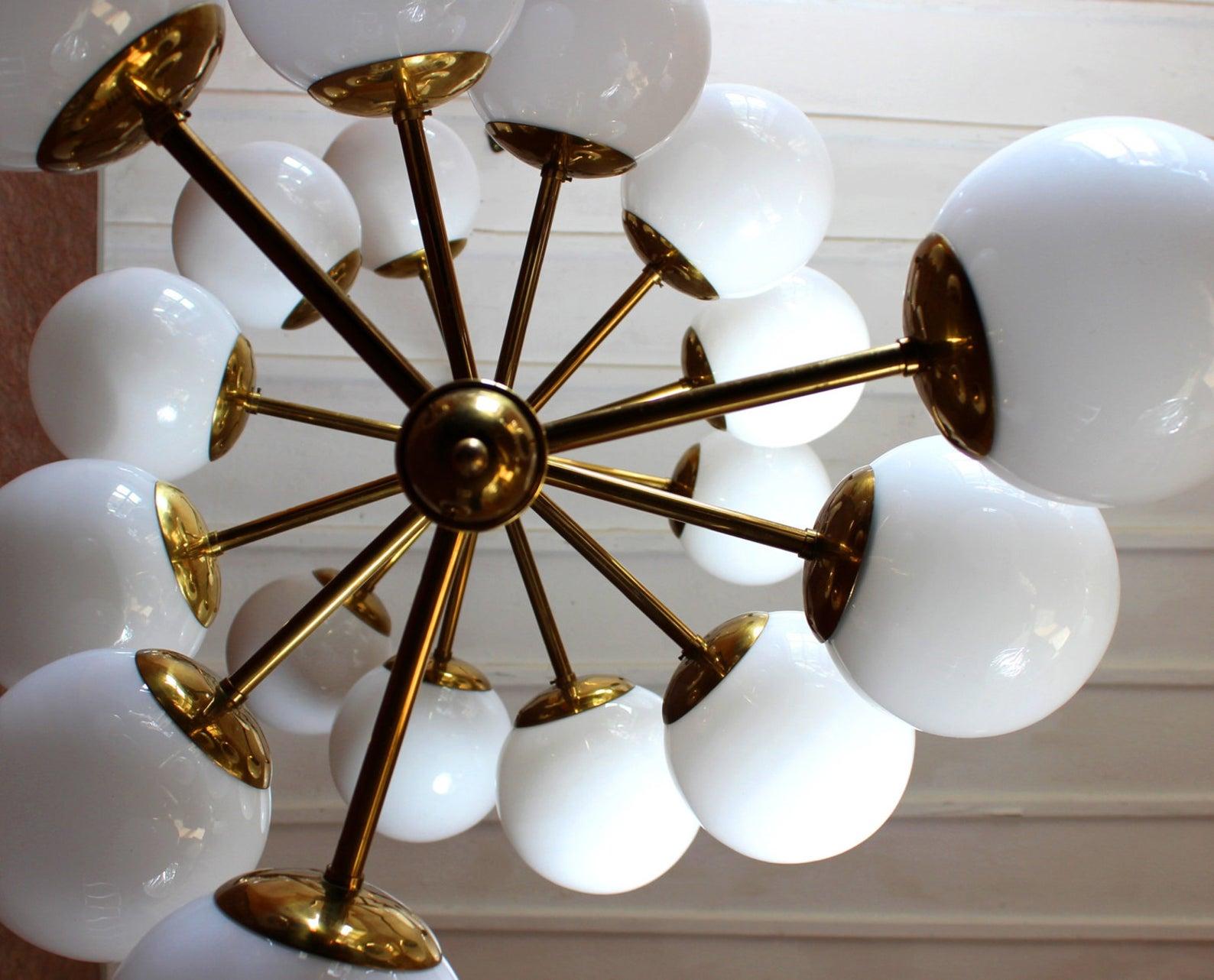 1 of 4 monumental atomic chandelier with alabaster glass globes and brass. 18 lights (E27)

Measures: Diameter 3 feet/ 90cm height 7 feet/ 213cm
 
We expose this lighting drafted by German furniture developers of the 1970s with accents of the