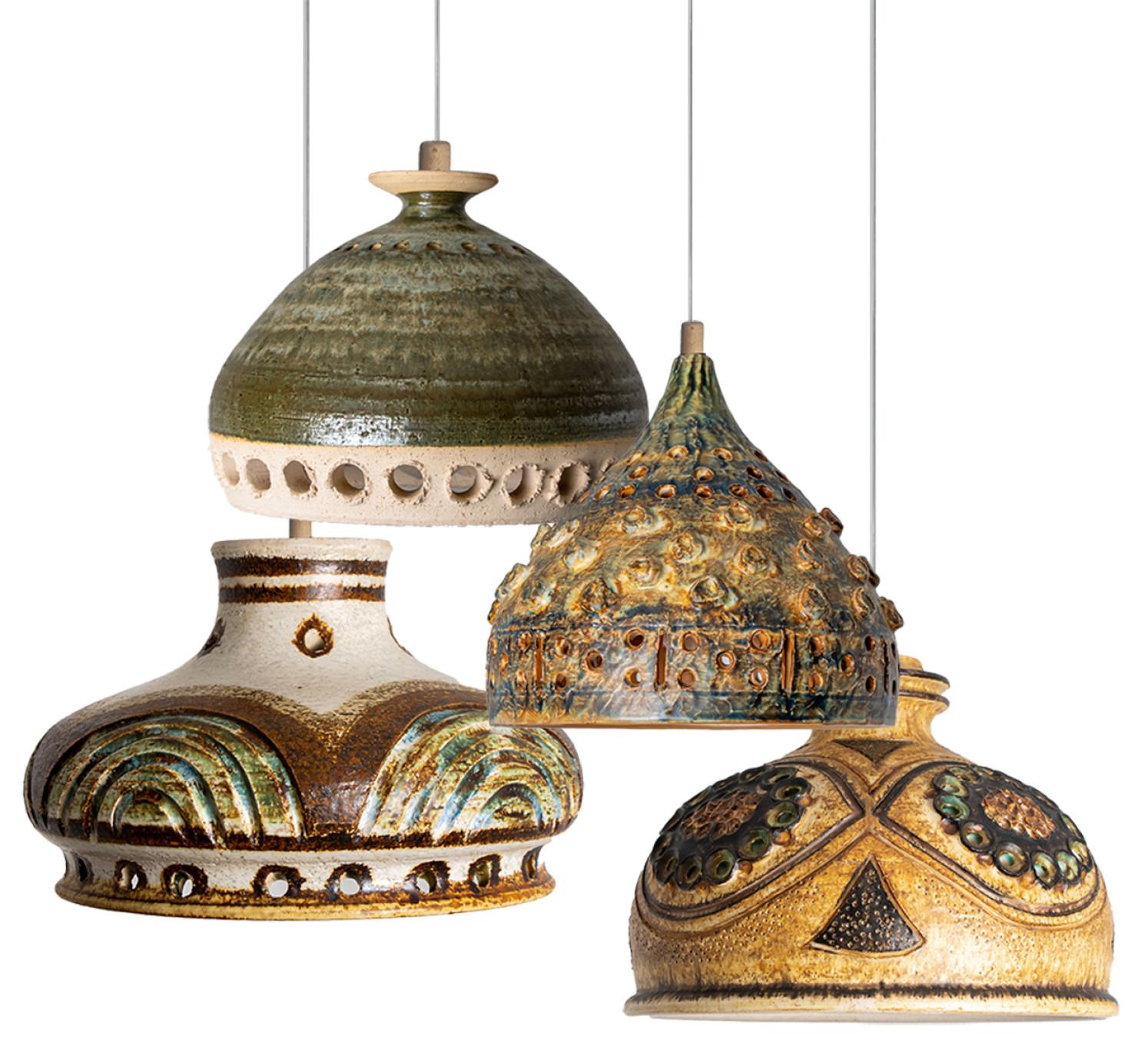 Playful arrangement of stunning round hanging lamps with an unusual shape, made with rich light colored brown ceramics, manufactured in the 1970s in Denmark. We have a multitude of unique colored ceramic light sets and arrangements, all available in