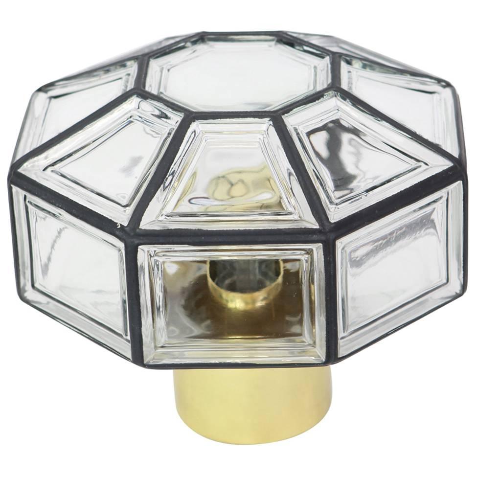 Minimalist iron and clear glass flush mount / or as a wall light , manufactured by Limburg Glashutte Germany, circa 1960-1969. Octagonally shaped lantern and multifaceted clear glass.

High quality and in very good condition. Cleaned, well-wired