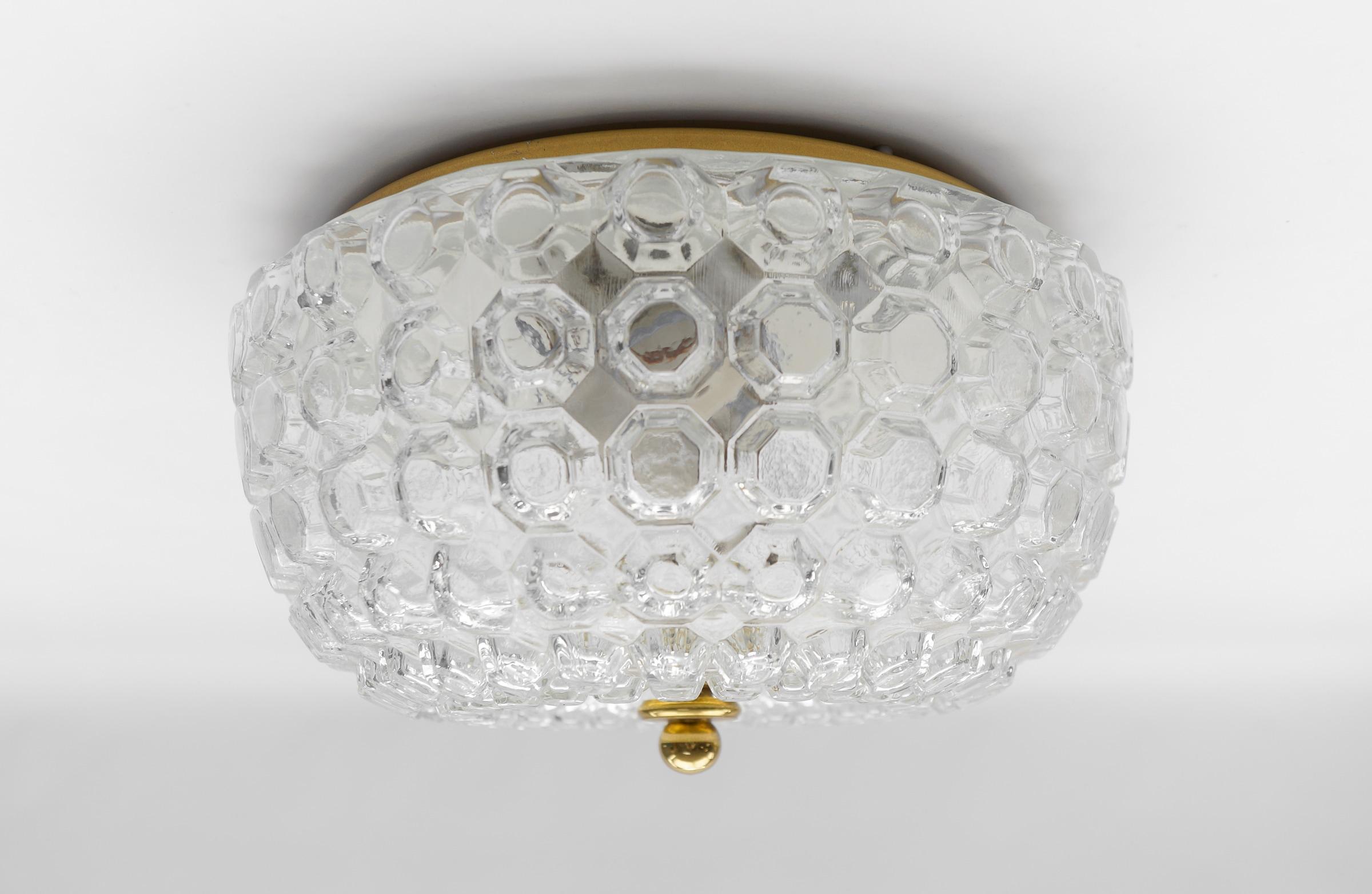 1 of 4 Large Flush Mount Lamp in Glass by Limburg, Gerrmany 1960s

We have four different sizes of the same model with 4 pieces per size which can also be found here on the platform.

The fixture need 1 x E27 standard bulb.

Light bulbs are not