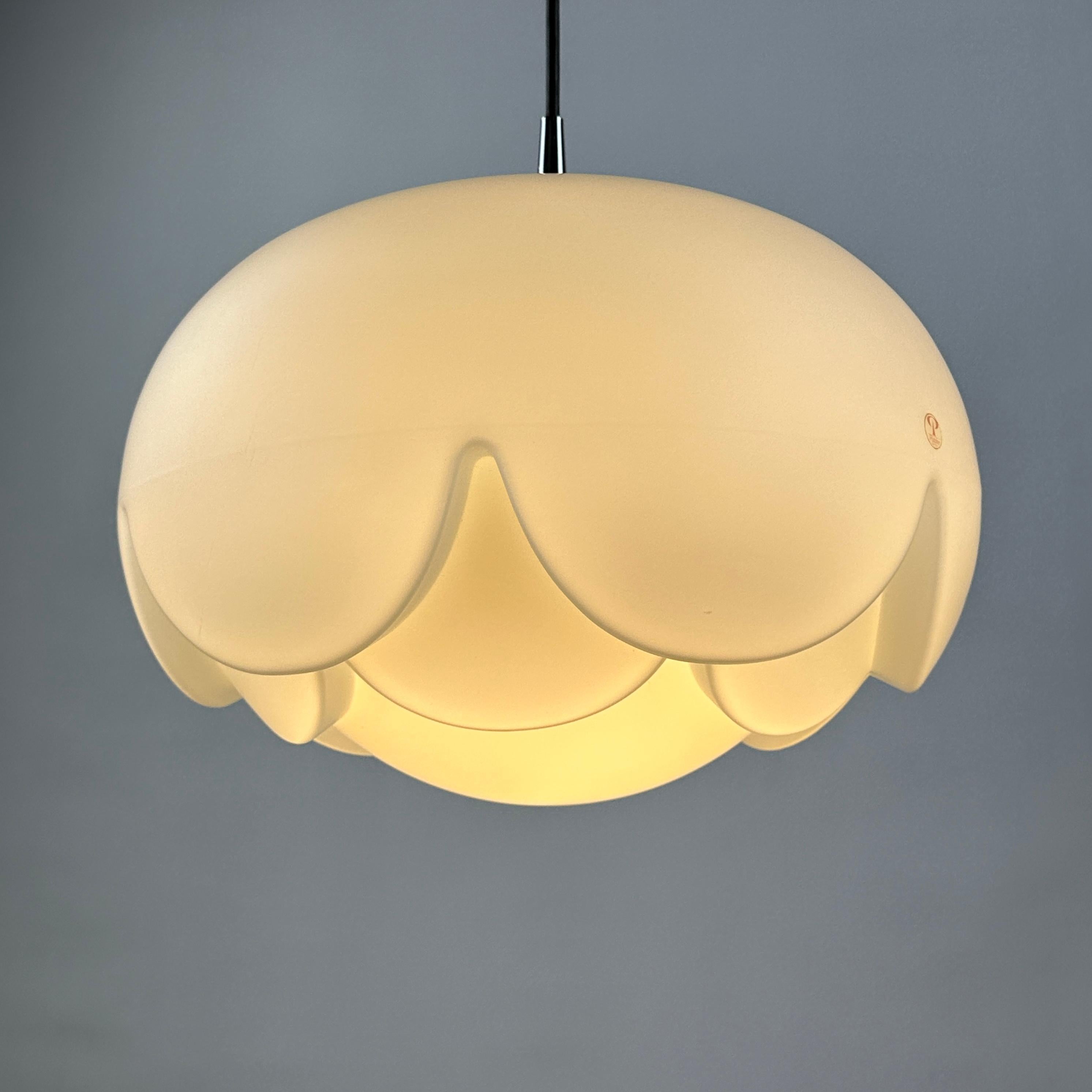 The Artichoke! This fantastic pendant light is manufactured by Peill & Putzler from Germany around 1970. This is the largest variant of the series and is shaped like a kind of flower, seerose or artichoke. Made of frosted glass and has a chrome