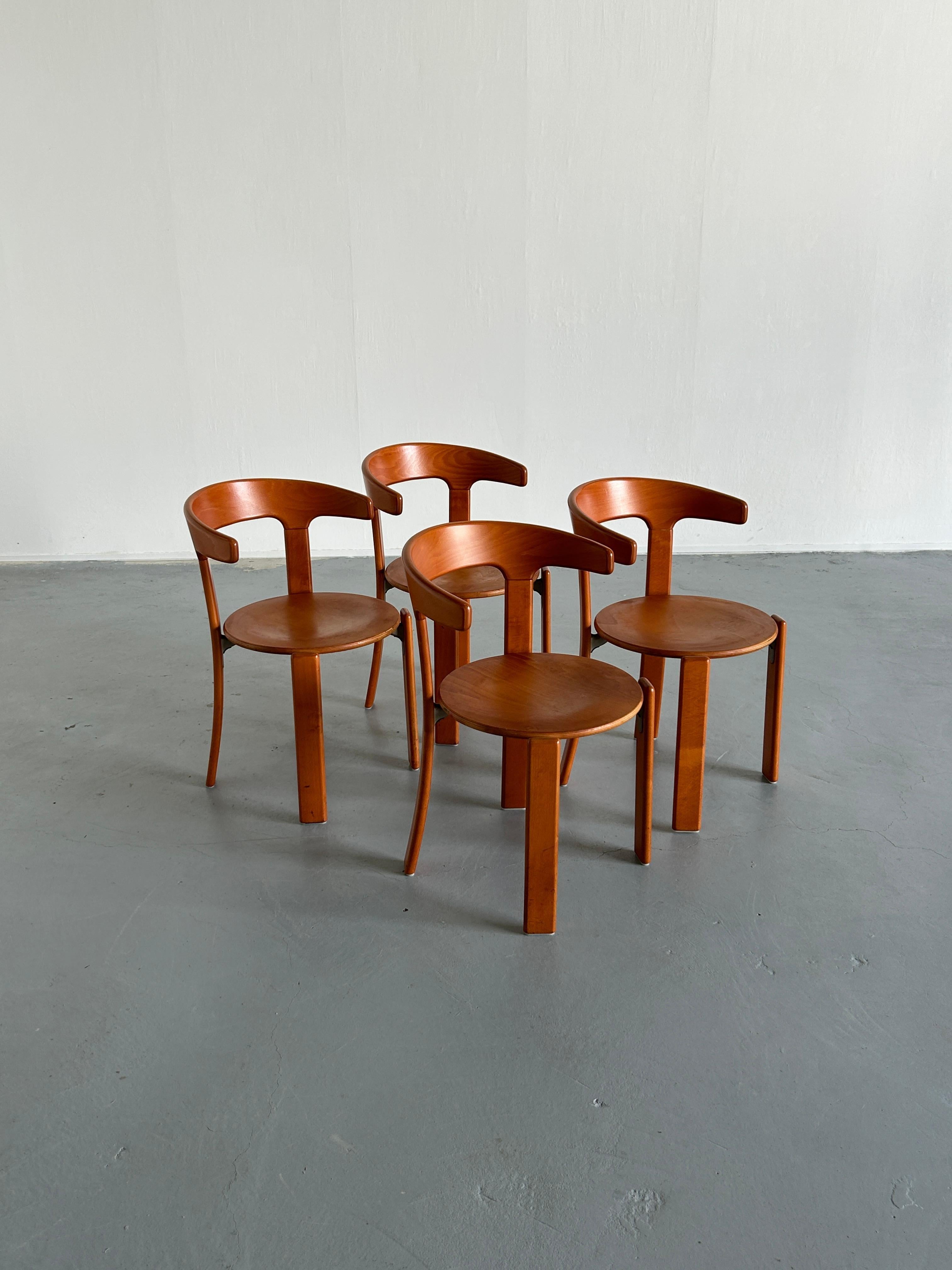 Set of four Mid-Century-Modern dining chairs designed by Bruno Rey, 1970s. Model with the armrests.

Produced by Kusch+Co, 1994.

The dining chairs were made of solid beech, laminated plywood beech and cast aluminum. Characteristic steel
