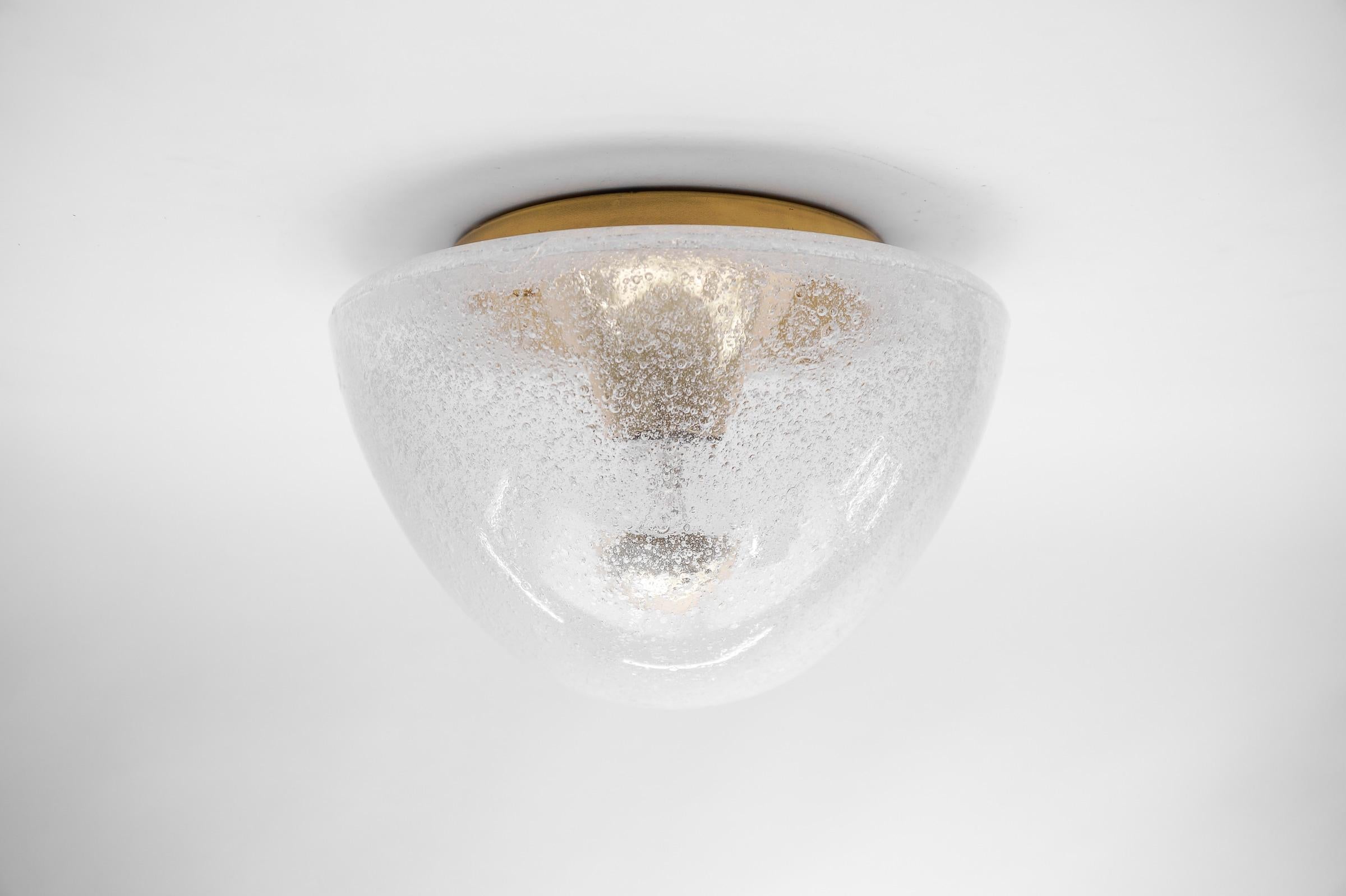 1 of 4 Mushroom Shaped Glass Lamp in Gold, Germany 1960s

Dimensions
Height: 7.08 in. (18 cm)
Diameter: 10.23 in. (26 cm)

The fixture need 1 x E27 standard bulb with 60W max.

Light bulbs are not included.
It is possible to install this fixture in