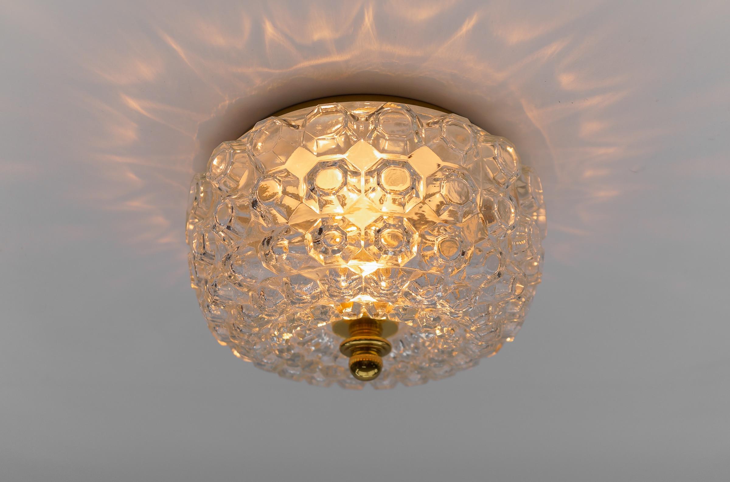 1 of 4 Petite Elegant Flush Mount Lamp in Glass by Limburg, Gerrmany 1960s

We have four different sizes of the same model with 4 pieces per size which can also be found here on the platform.

The fixture need 1 x E27 standard bulb.

Light bulbs are