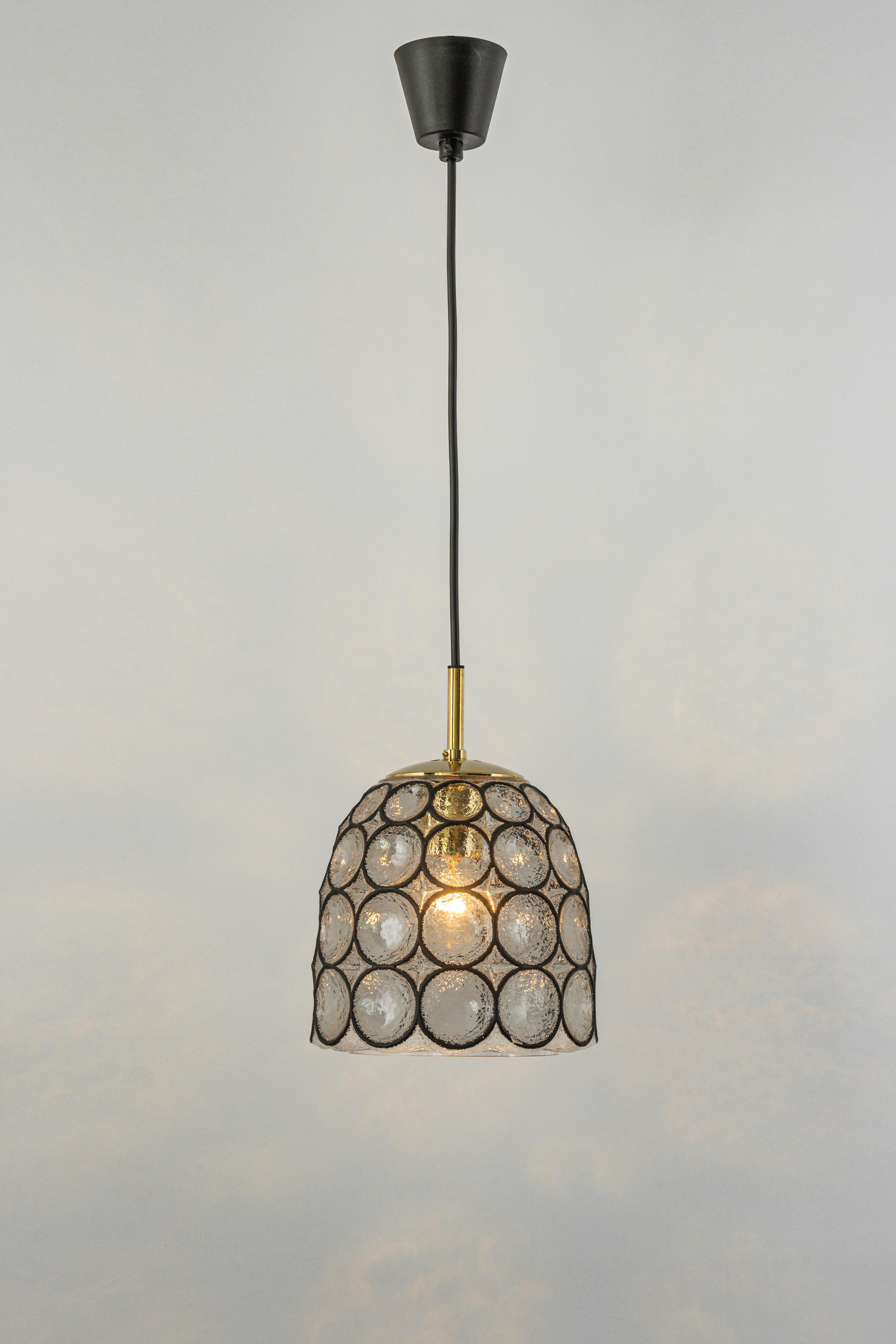 1 of 4 Petite Minimalist iron and clear glass pendant light manufactured by Limburg Glashutte, Germany, circa 1960-1969. 

Heavy quality and in very good condition. Cleaned, well-wired, and ready to use. Each fixture requires 1 x E27 Standard